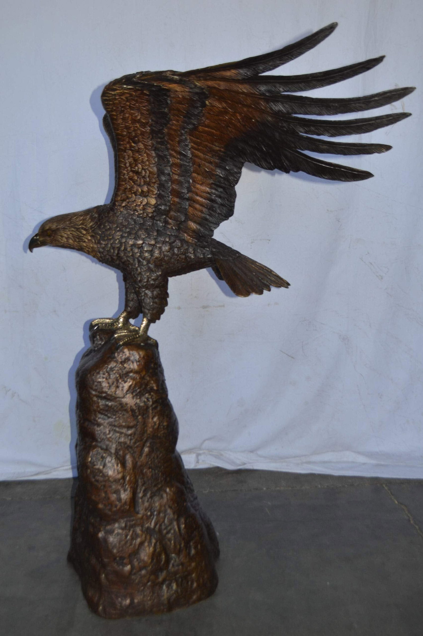 Eagle Landing on a Rock Bronze Statue - Size: 51"L x 36"W x 58"H. - 8