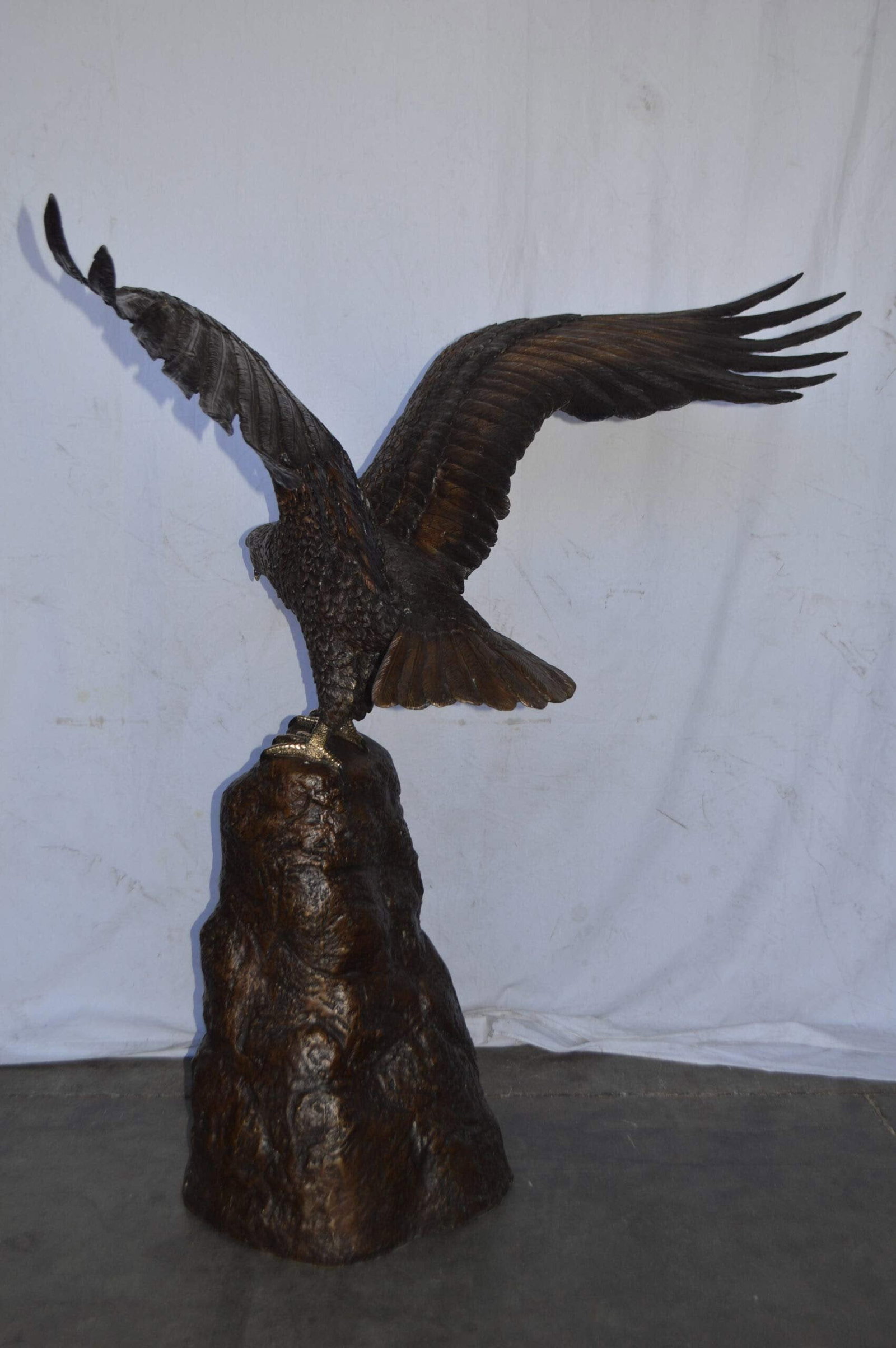 Eagle Landing on a Rock Bronze Statue - Size: 51"L x 36"W x 58"H. - 9