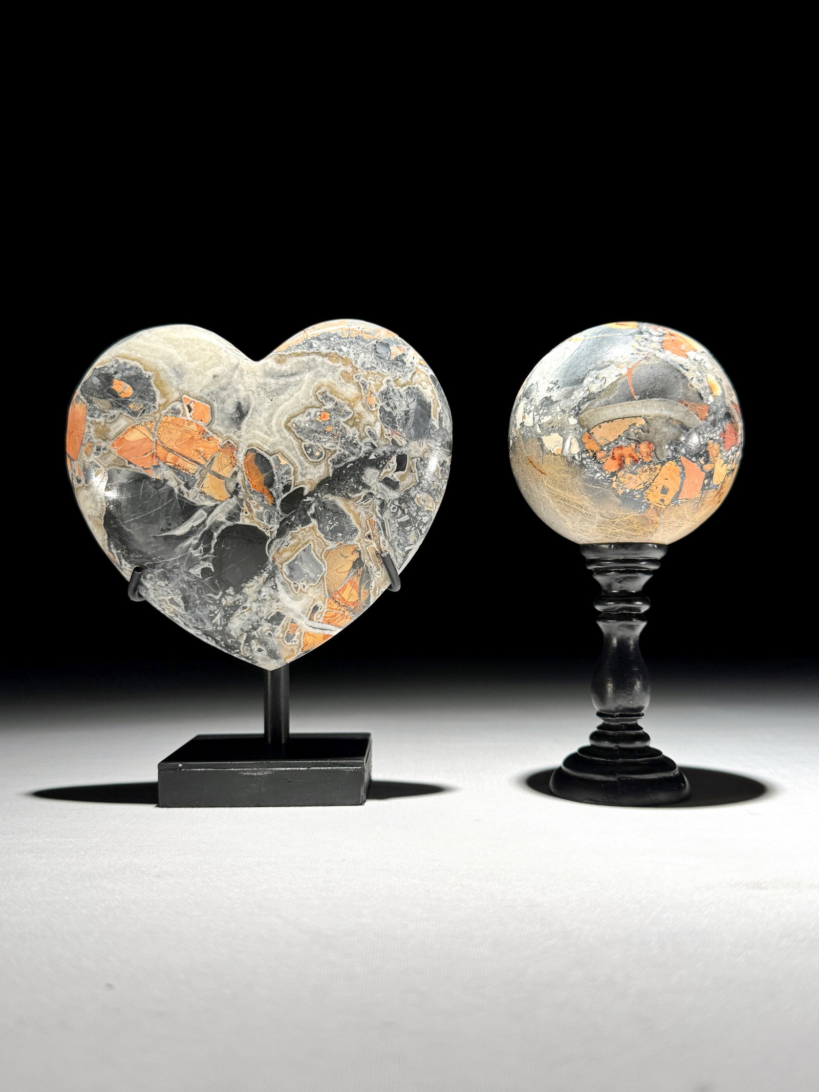Stunning set of a crystalized Maligano Jasper heart and sphere with stands: Title: Stunning set of a crystalized Maligano Jasper heart and sphere with stands Maker:Unknown Origin: Indonesia Date/Period:2026 Materials:Maligano Jasper, wood, steel, resin Dimensions:Dimensions h