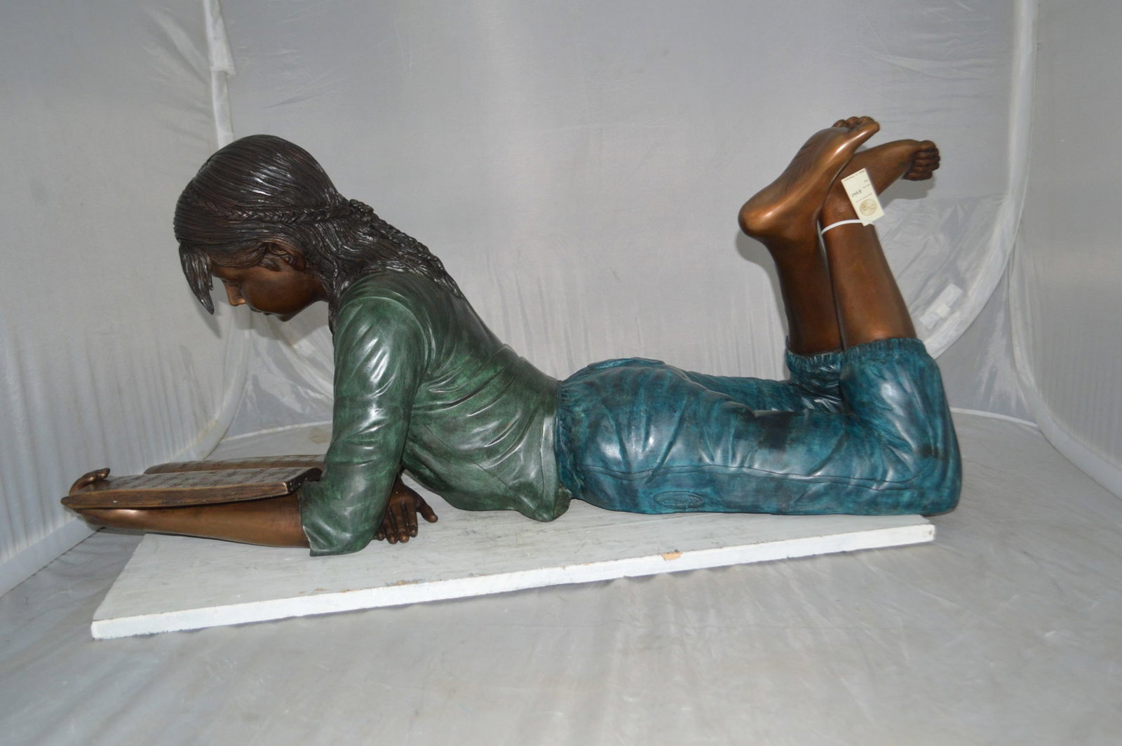 Kate Reading a Book Bronze Statue - Size: 42"L x 18"W x 17"H. - 8