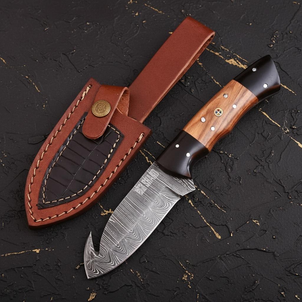 Full Tang Damascus Gut Hook Skinner Knife with Sheath, Twisted Steel & Wood Handle: Title:Full Tang Damascus Gut Hook Skinner Knife with Sheath, Twisted Steel & Wood Handle Description:Discover a masterfully crafted, full-tang skinner knife designed for durability and performance.