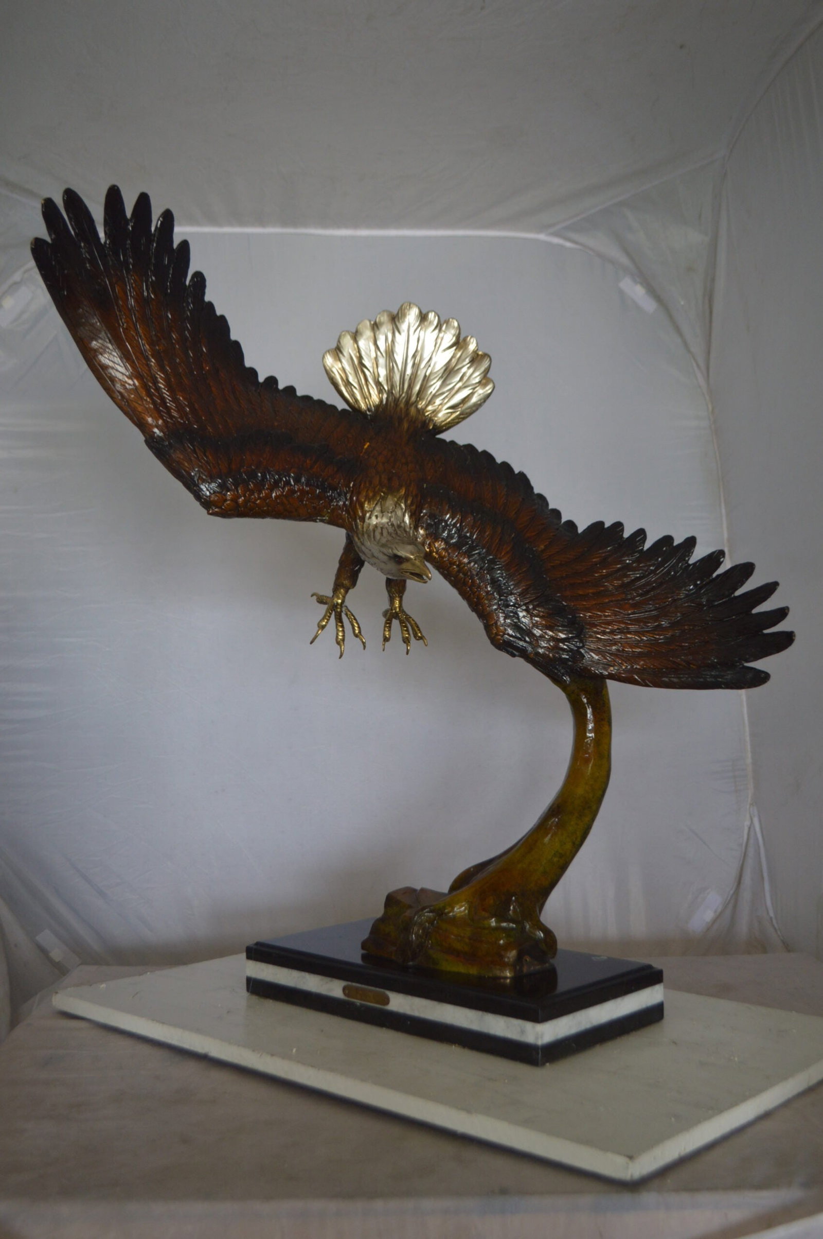 Eagle Soaring Bronze Statue by W Aribu - Size: 35"L x 27"W x 38"H. - 10