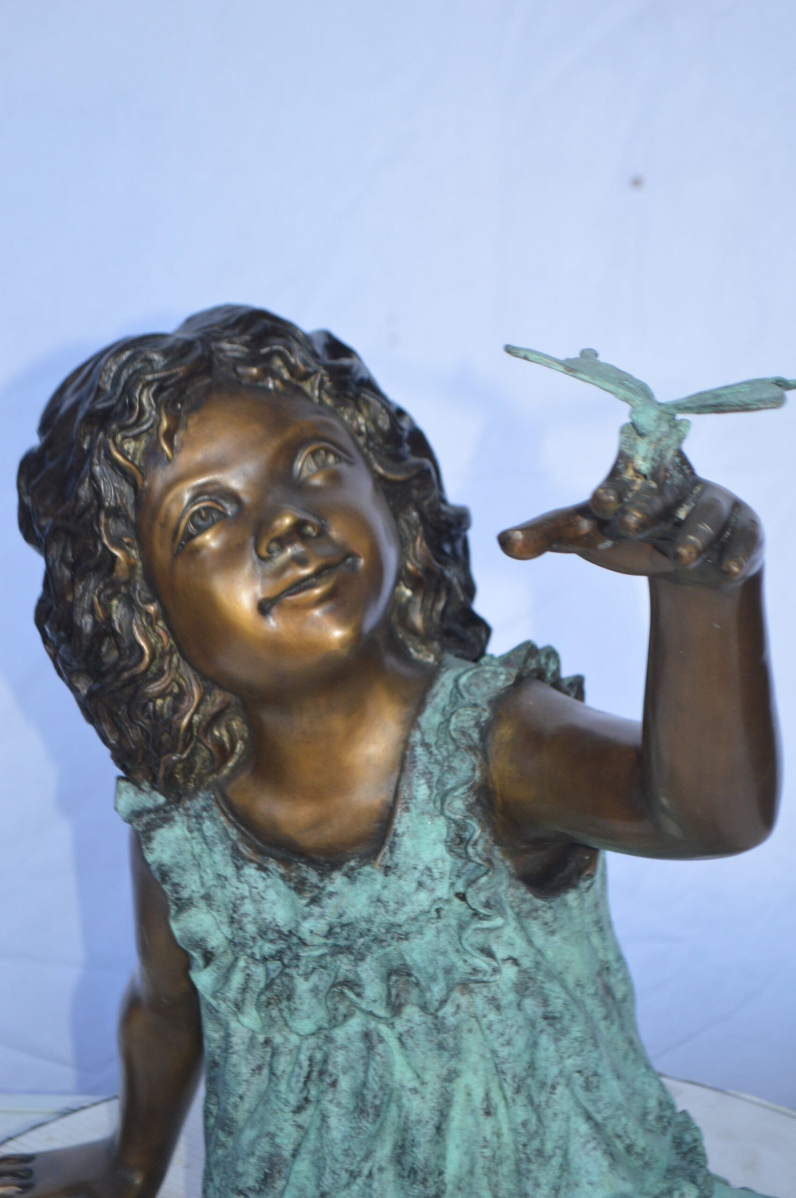 Girl Playing With Butterfly Bronze Statue - Size: 21"L x 15"W x 19"H. - 10