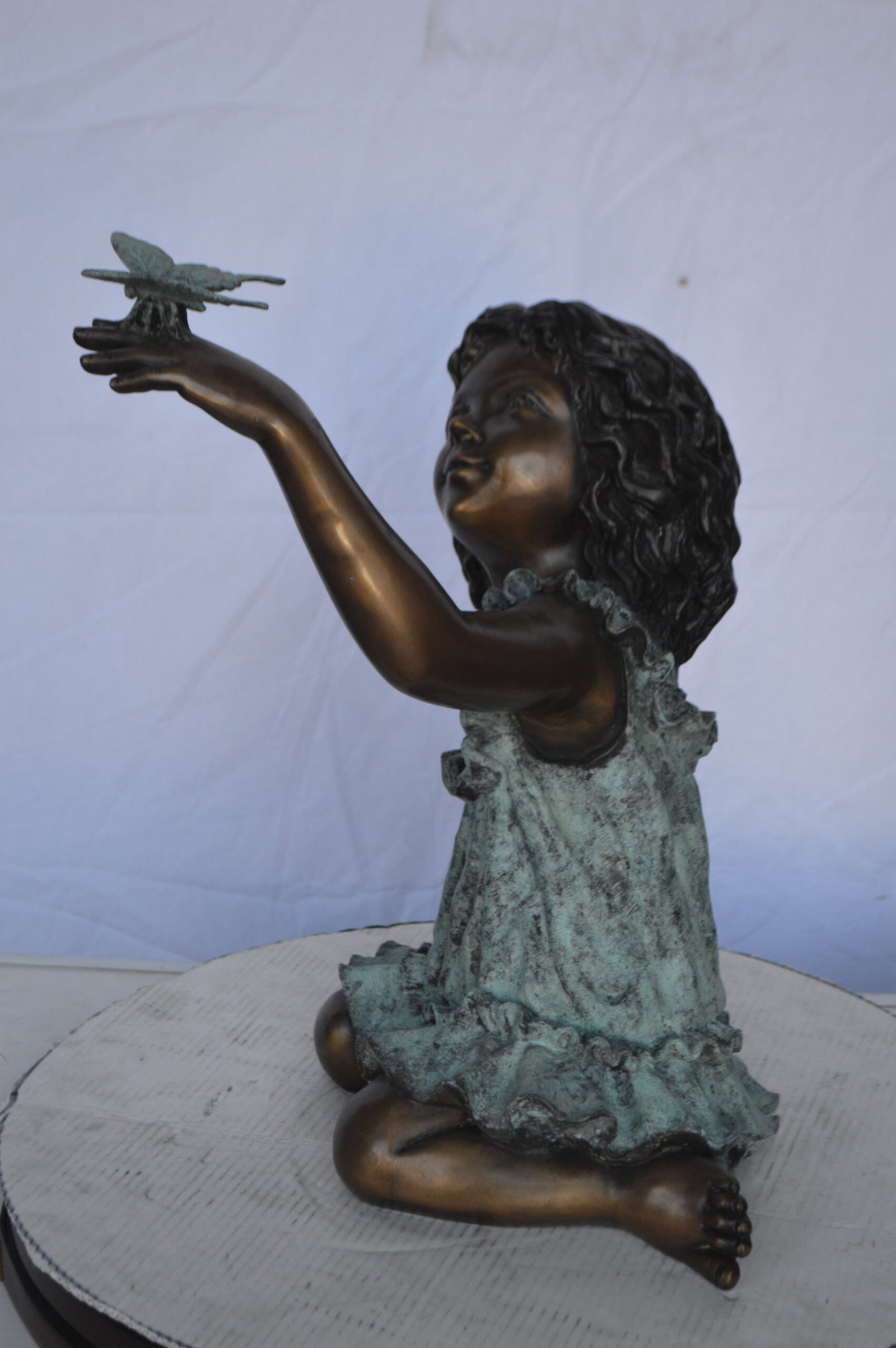 Girl Playing With Butterfly Bronze Statue - Size: 21"L x 15"W x 19"H. - 5
