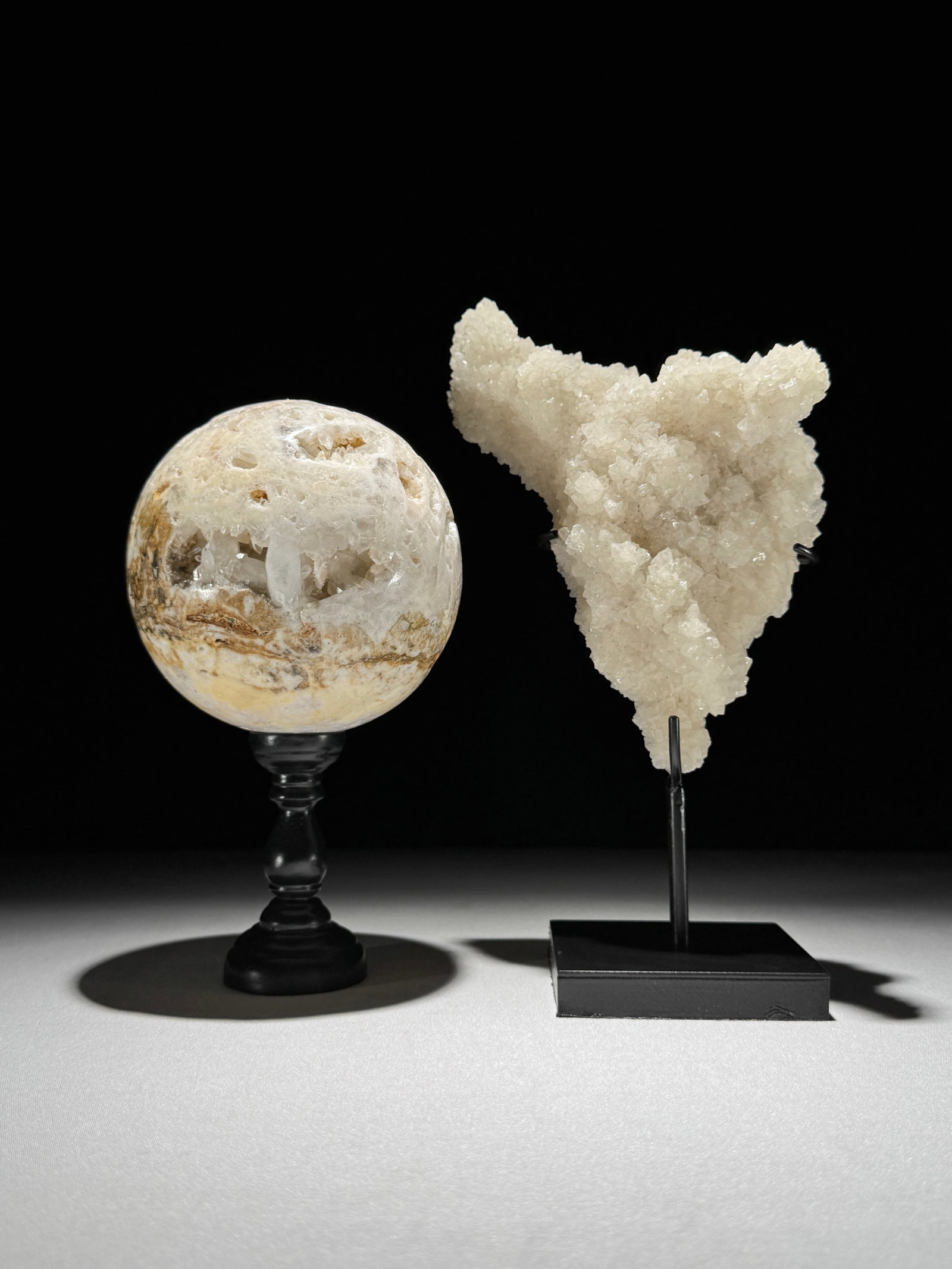 Wonderful set of a crystal sphere and a large cube calcite cluster on stands (1 of 10)