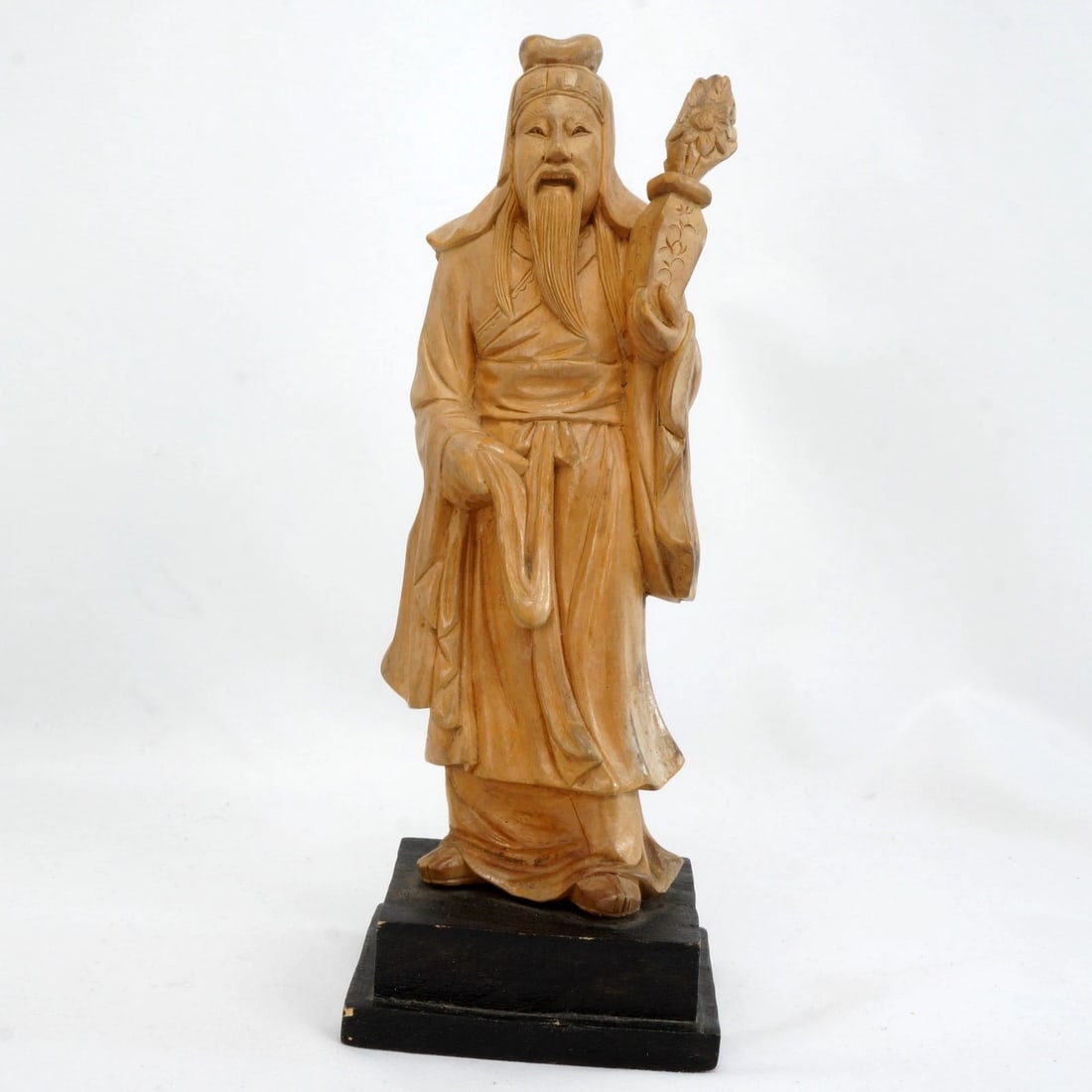 1930s Chinese Hardwood Carving Immortal: Title:1930s Chinese Hardwood Carving Immortal Size:7 5/8 in (19.4 cm) tall x 2 ¾ in (7.0 cm) wide x 2 5/8 in (6.7 cm) deep. Description:A detailed, deep hardwood carving of a finely dressed