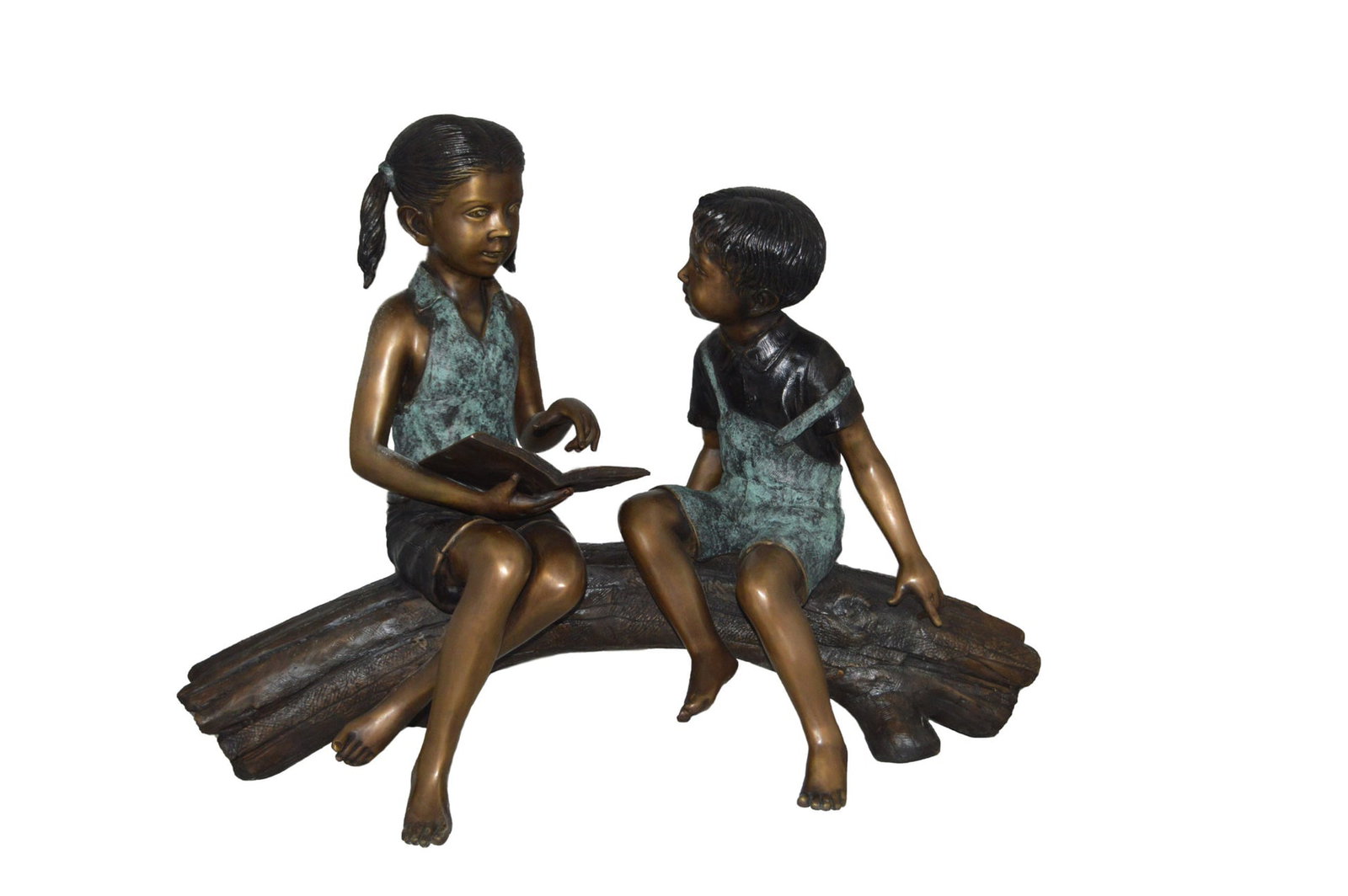 Boy and Girl on a tree log reading Bronze Statue - Size: 37"L x 14"W x 27"H.: Title:Boy and Girl on a tree log reading Bronze Statue - Size: 37"L x 14"W x 27"H. Description:Magnificent large size bronze of a girl and a boy sitting on a tree log outside and reading a book. The j