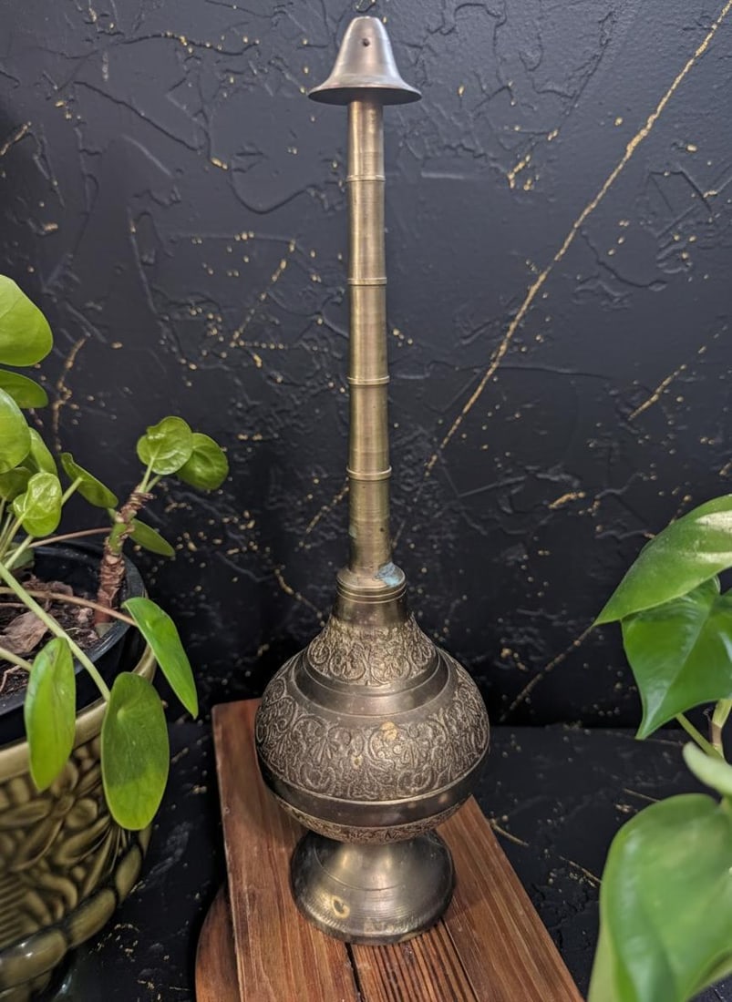 11" Tall Vintage Brass Gulabdan, a Rose & Holy Water Sprinkler for Ceremony Decor: Title:11" Tall Vintage Brass Gulabdan, a Rose & Holy Water Sprinkler for Ceremony Decor Description:This listing is for a vintage Gulabdan, a traditional brass sprinkler designed for rose or holy wate