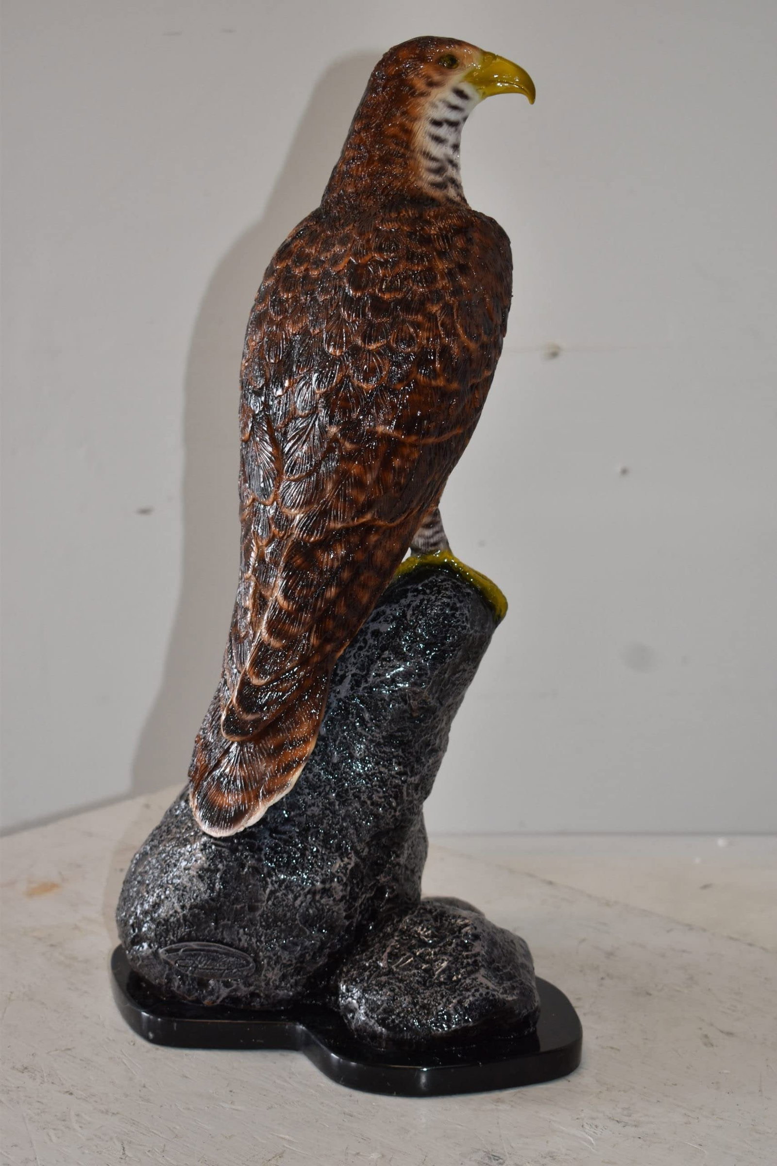 Eagle Standing on a Rock Looking for Prey Size: 10" x 13" x 22"H - 10