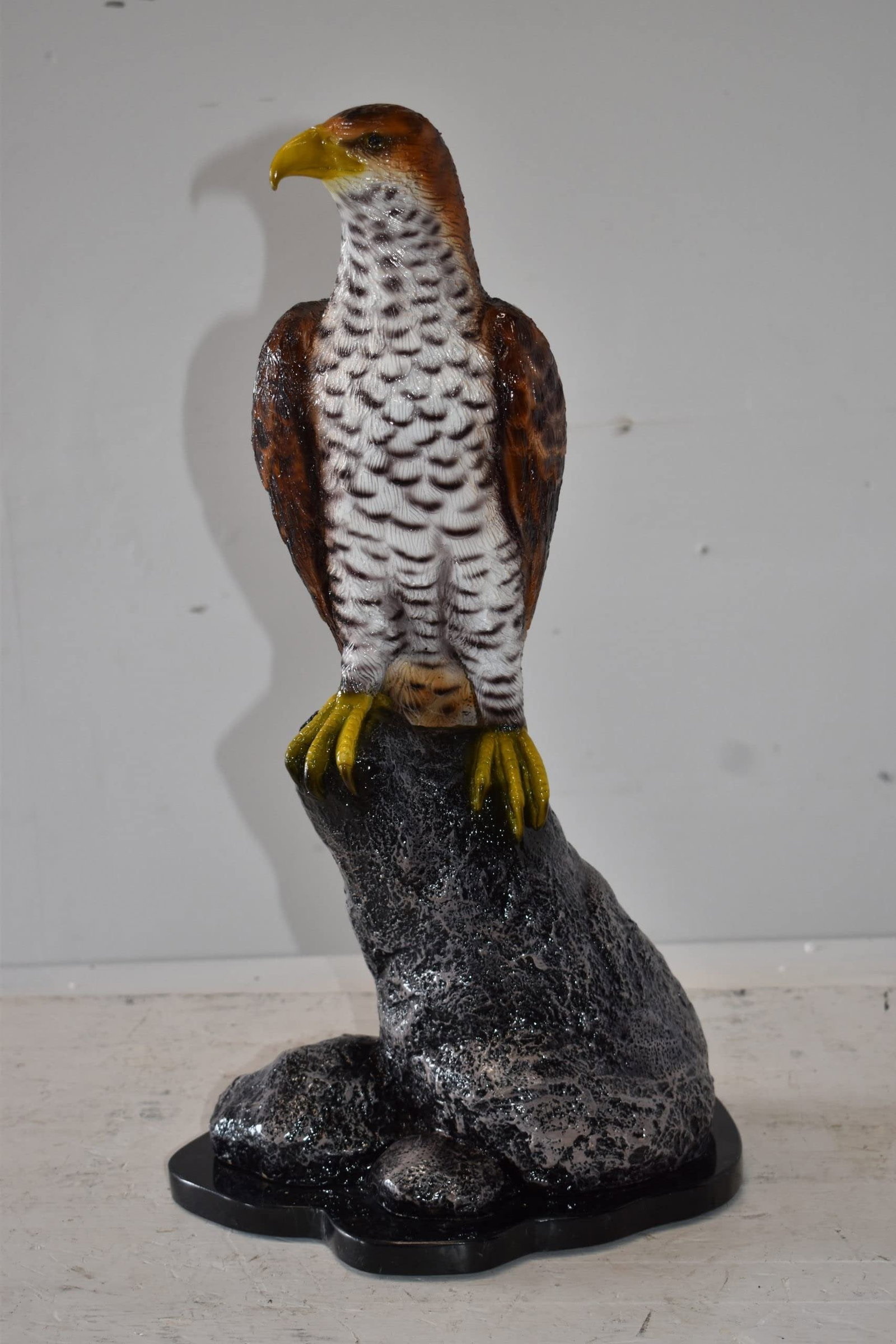 Eagle Standing on a Rock Looking for Prey Size: 10" x 13" x 22"H - 4
