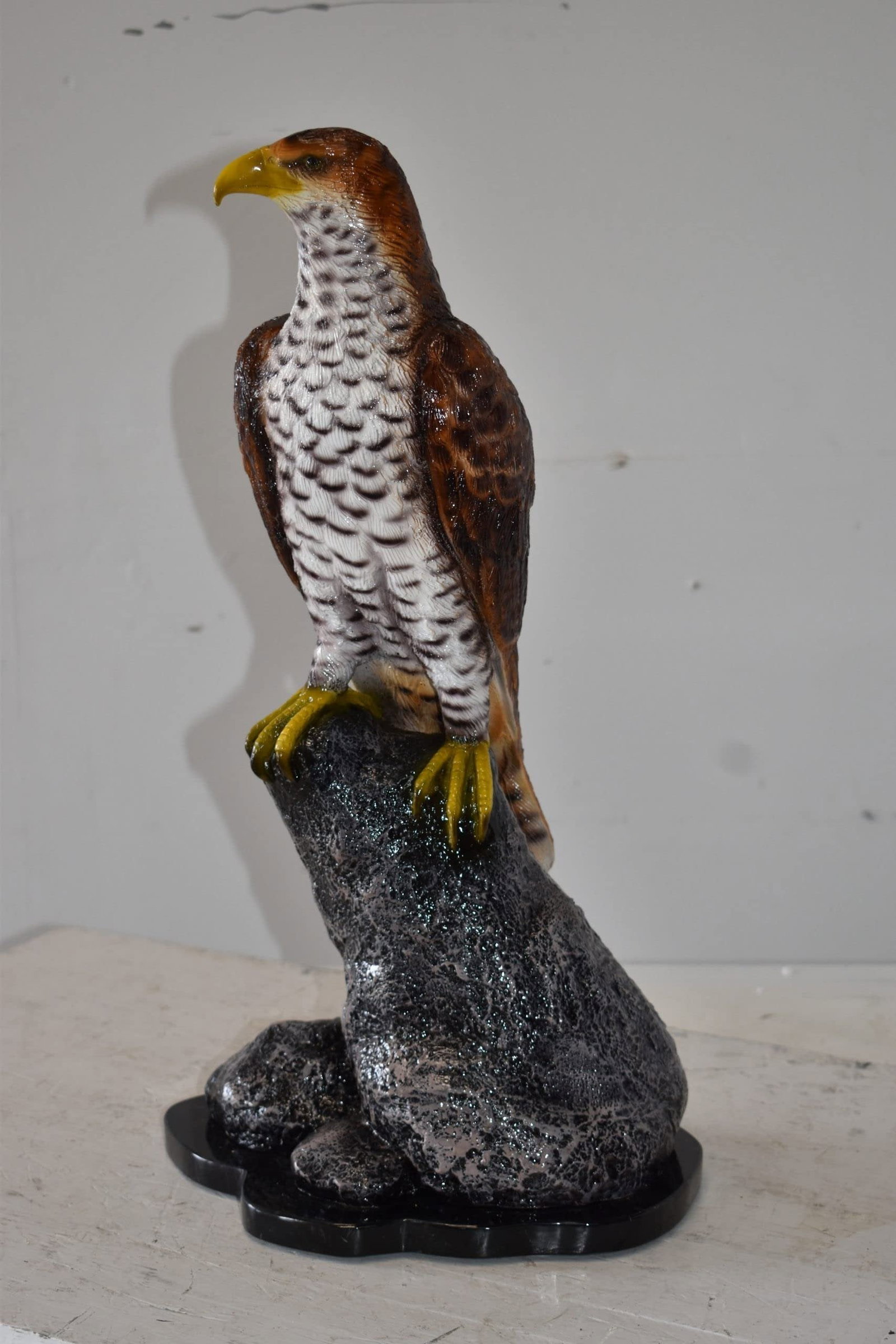 Eagle Standing on a Rock Looking for Prey Size: 10" x 13" x 22"H - 5