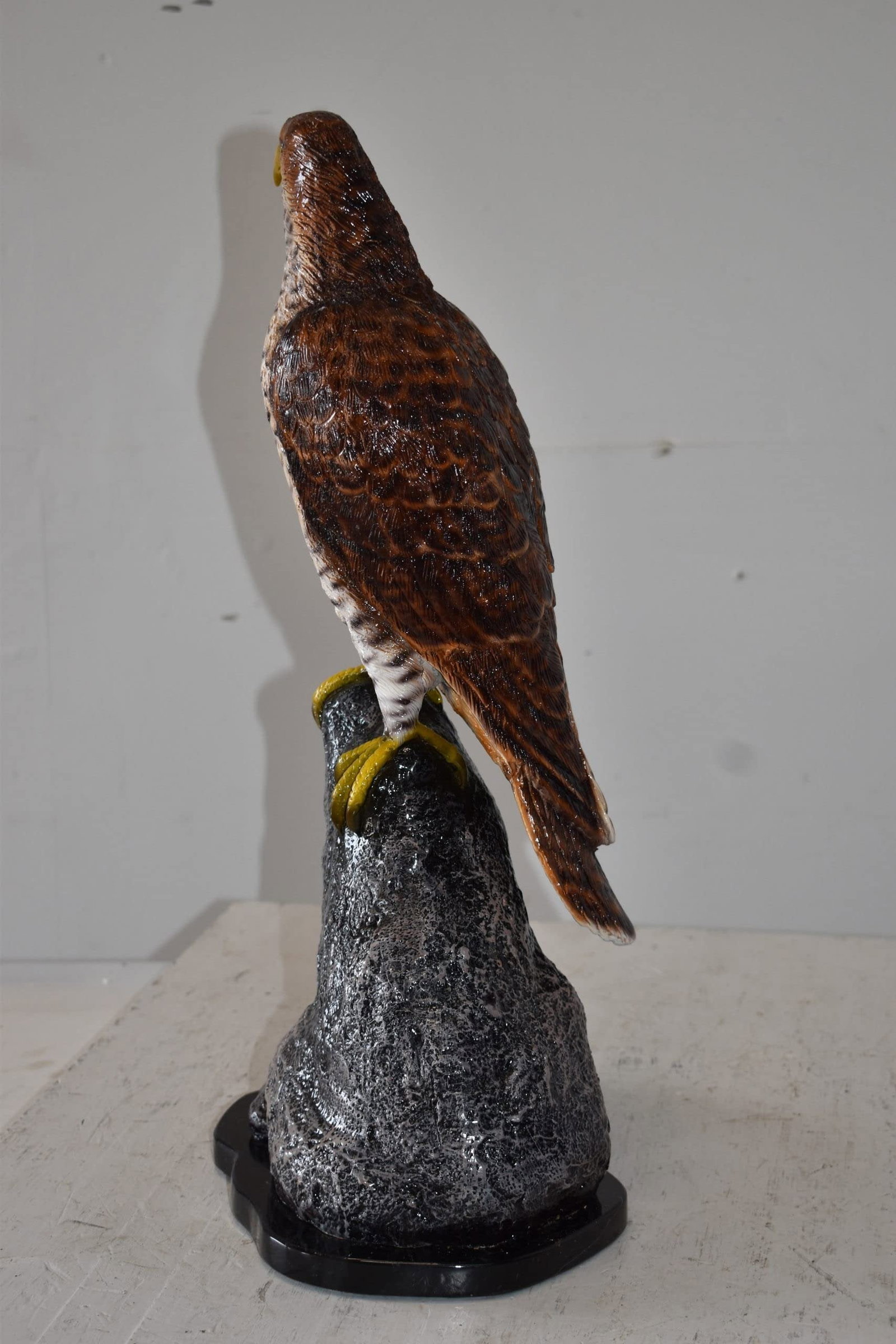 Eagle Standing on a Rock Looking for Prey Size: 10" x 13" x 22"H - 7
