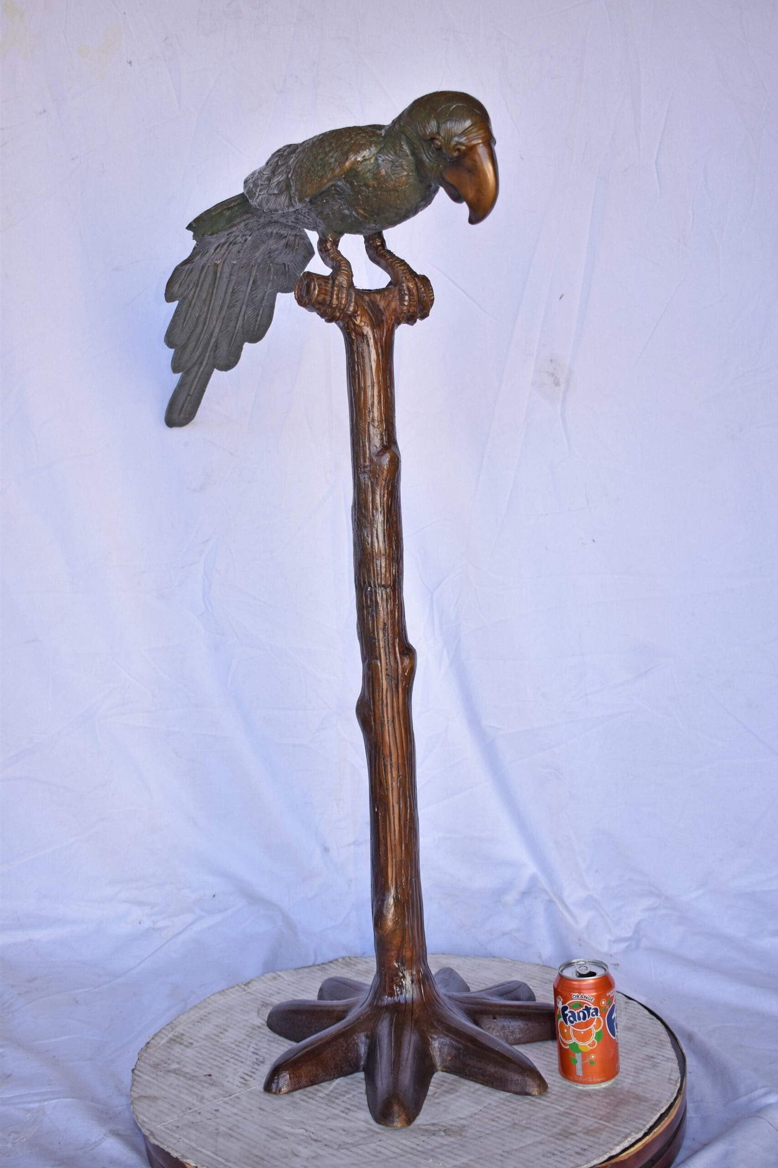 Parrot on a Tree Watching Forward Bronze Statue - Size: 36"L x 15"W x 41"H. - 5