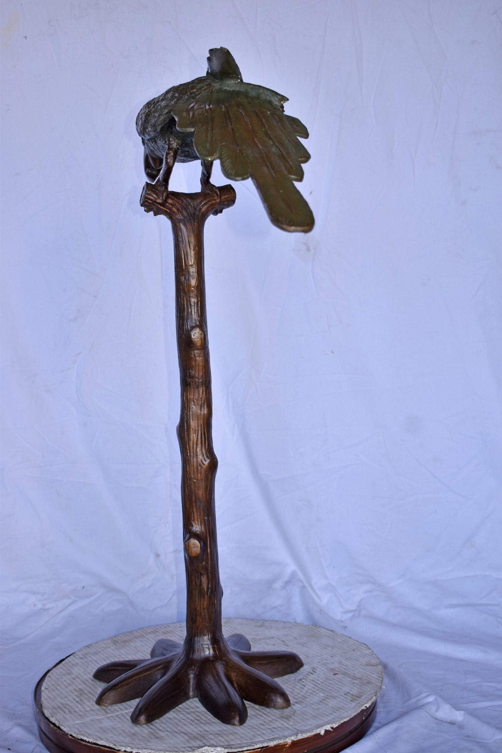 Parrot on a Tree Watching Forward Bronze Statue - Size: 36"L x 15"W x 41"H. - 9