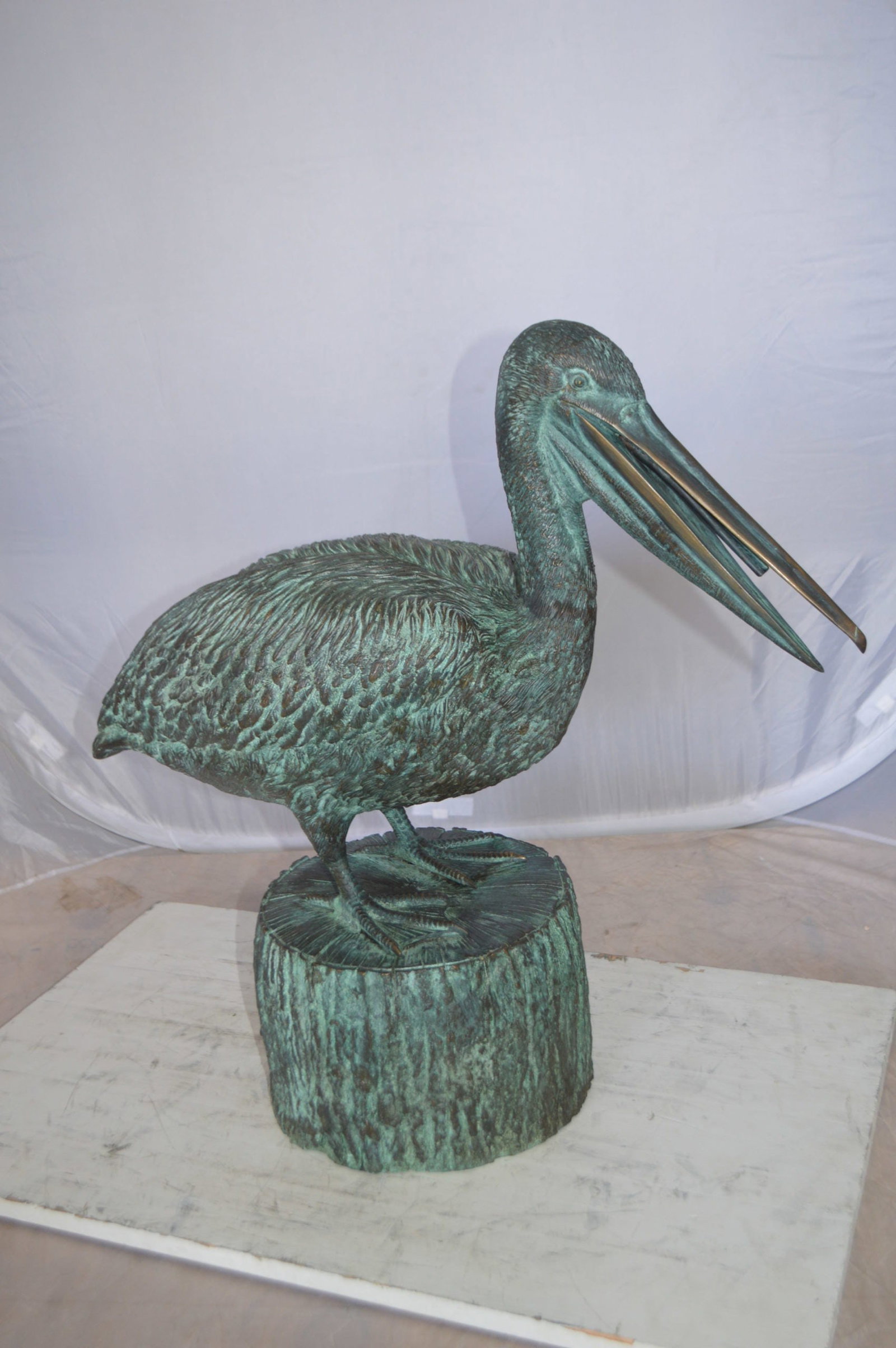 Pelican on a Tree Stump fountain bronze statue - Size: 30"L x 16"W x 30"H. - 10