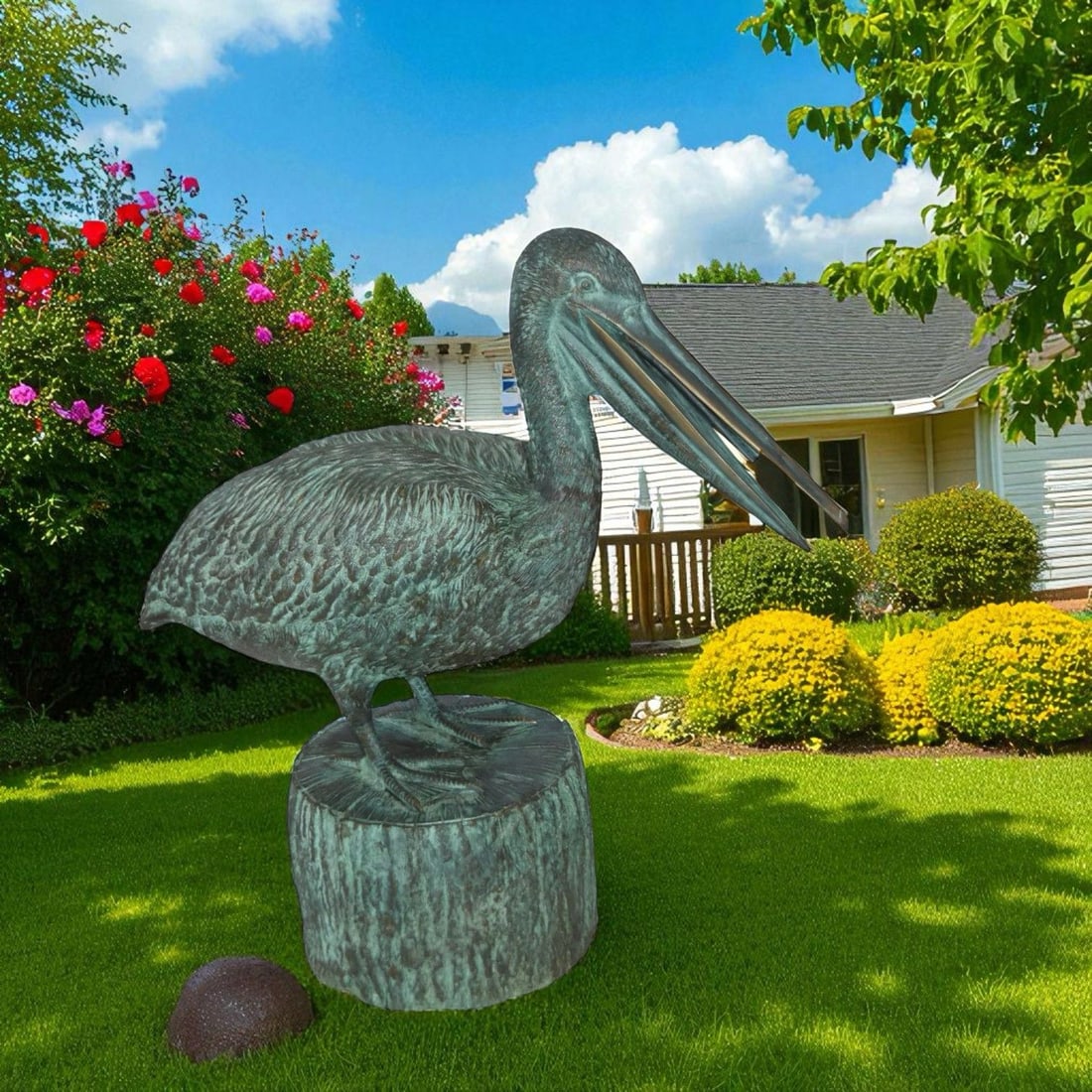 Pelican on a Tree Stump fountain bronze statue - Size: 30"L x 16"W x 30"H. - 2