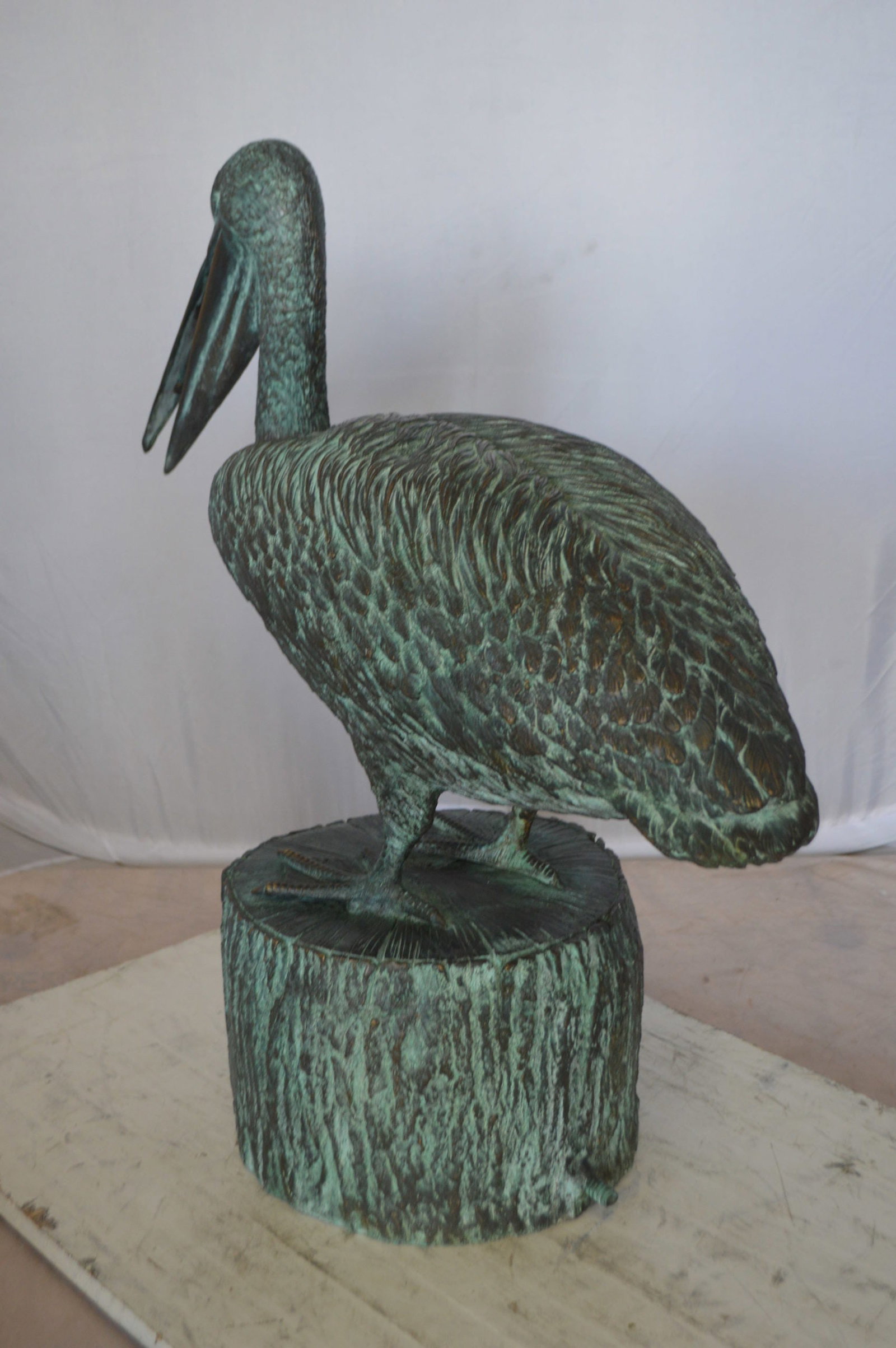 Pelican on a Tree Stump fountain bronze statue - Size: 30"L x 16"W x 30"H. - 6