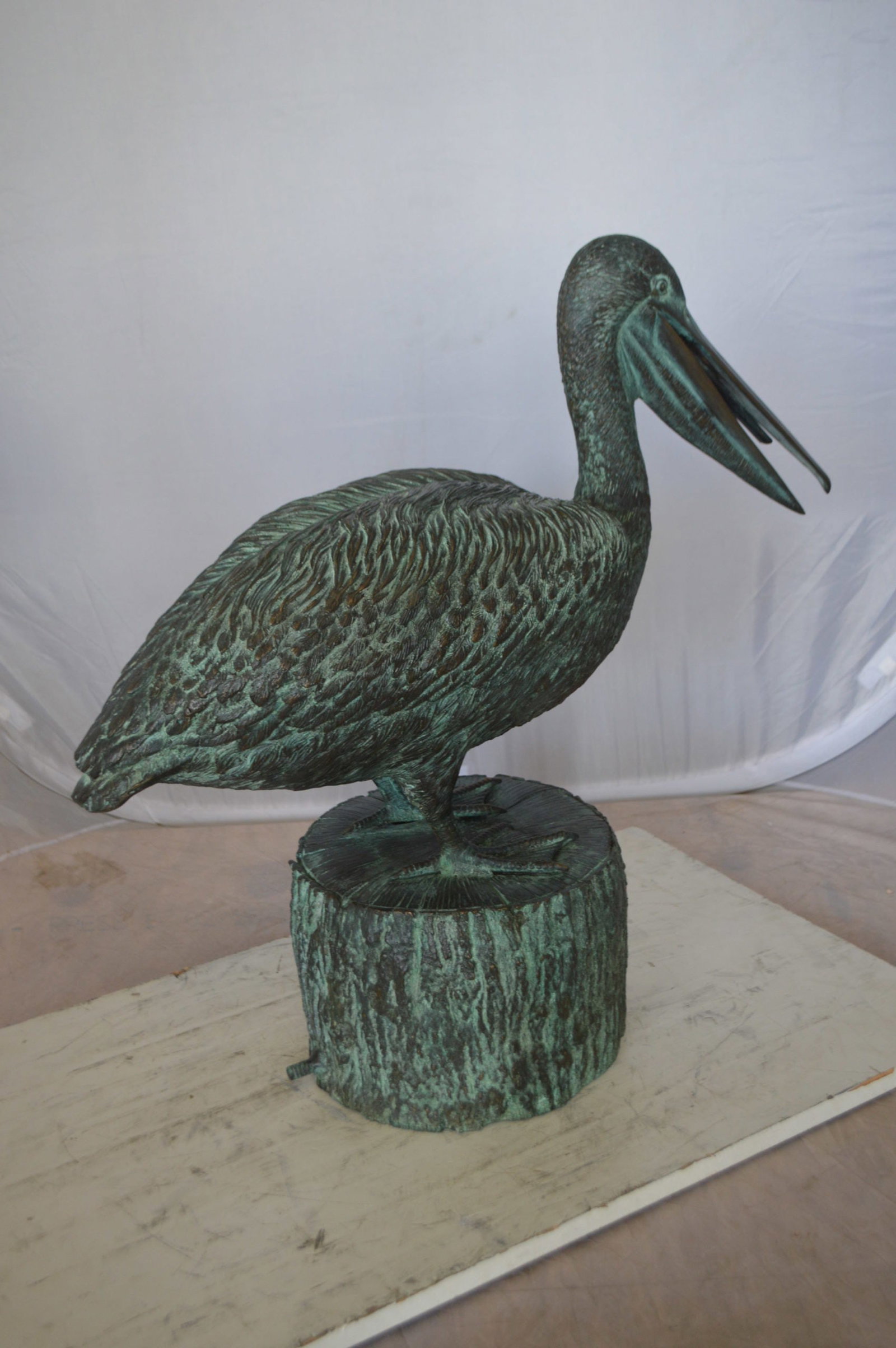 Pelican on a Tree Stump fountain bronze statue - Size: 30"L x 16"W x 30"H. - 9