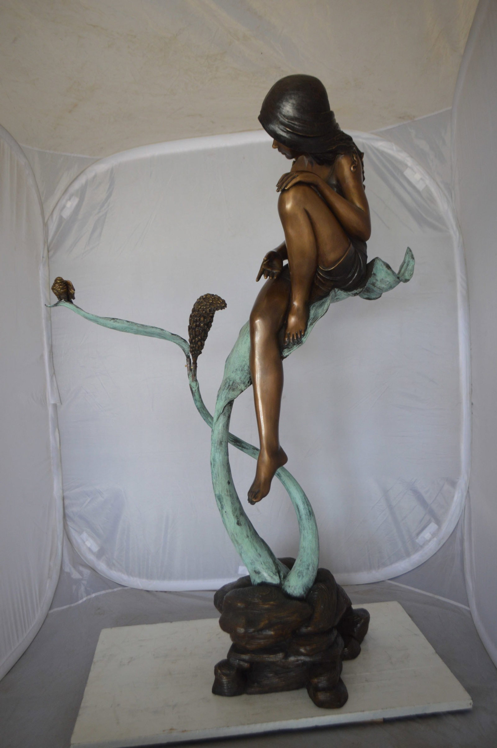 Beautiful Young Girl Sitting on a Tree Bronze Statue - 35"L x 50"W x 55"H. - 10