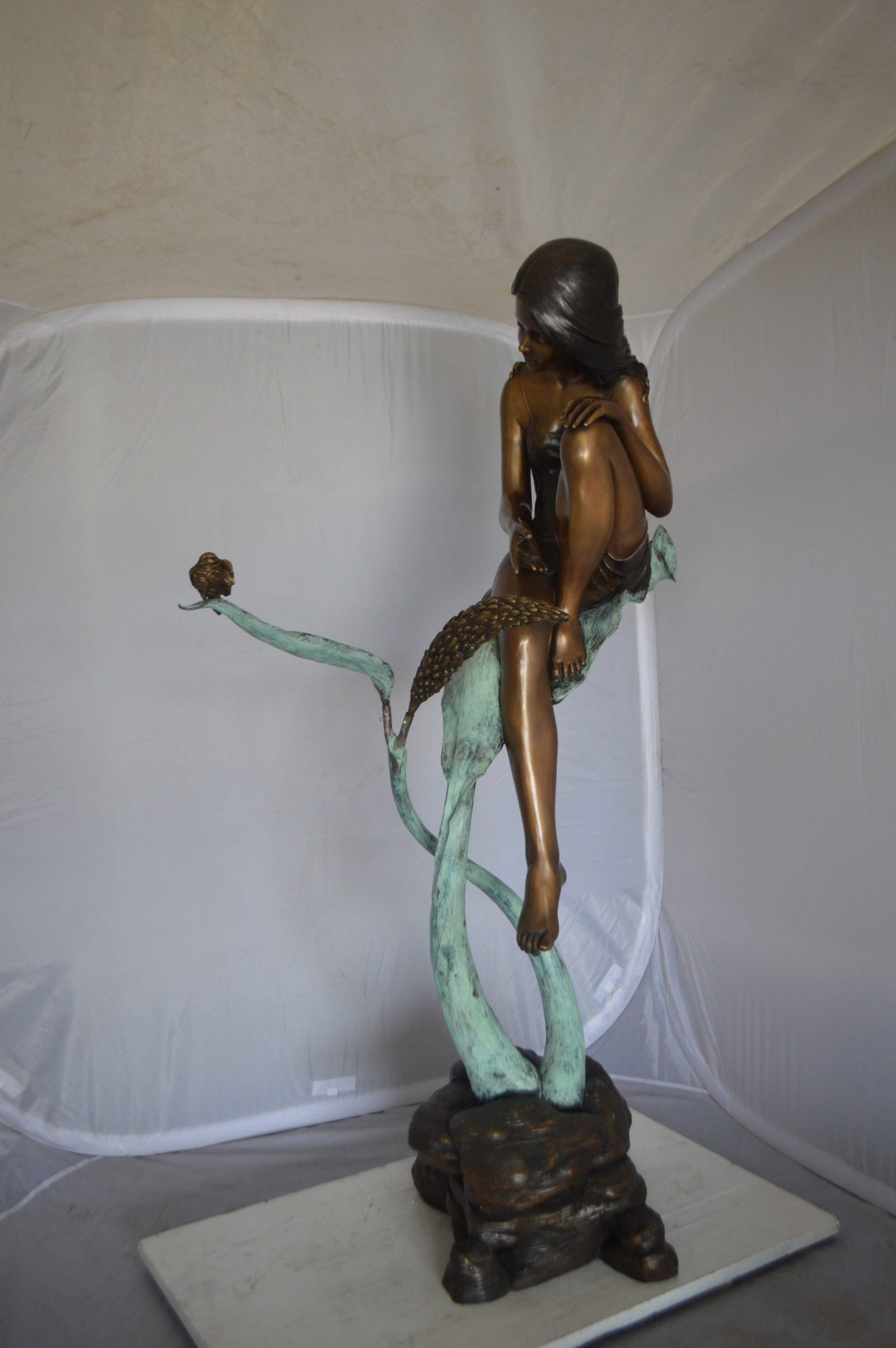 Beautiful Young Girl Sitting on a Tree Bronze Statue - 35"L x 50"W x 55"H. - 11