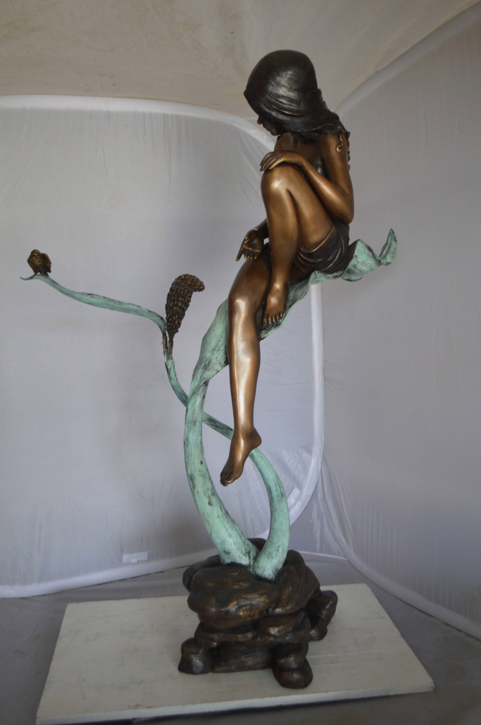 Beautiful Young Girl Sitting on a Tree Bronze Statue - 35"L x 50"W x 55"H. - 9