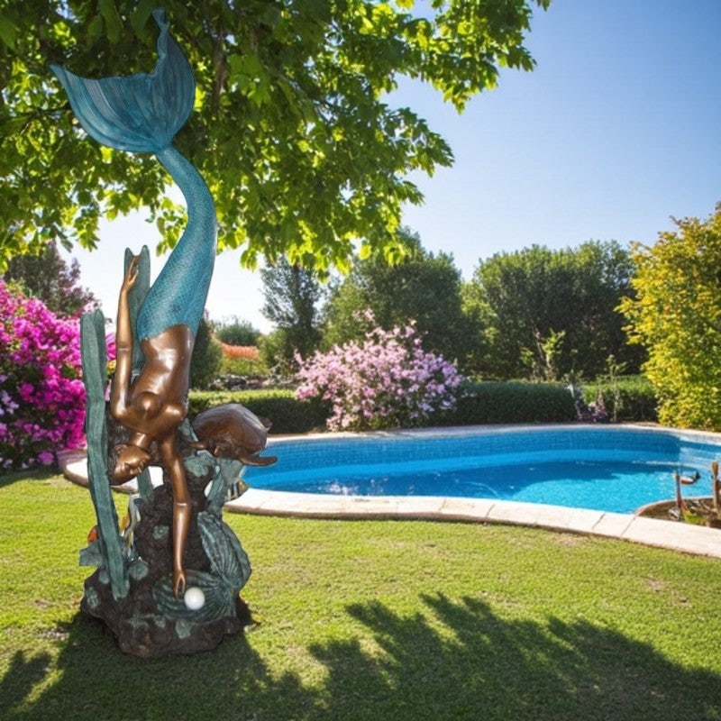 Mermaid Diving for a Pearl Fountain Bronze Statue - Size: 34"L x 27"W x 93"H.: Title:Mermaid Diving for a Pearl Fountain Bronze Statue - Size: 34"L x 27"W x 93"H. Description:No lover of timeless sea lore and the mysteries of the deep sea can resist this incredibly detailed stat