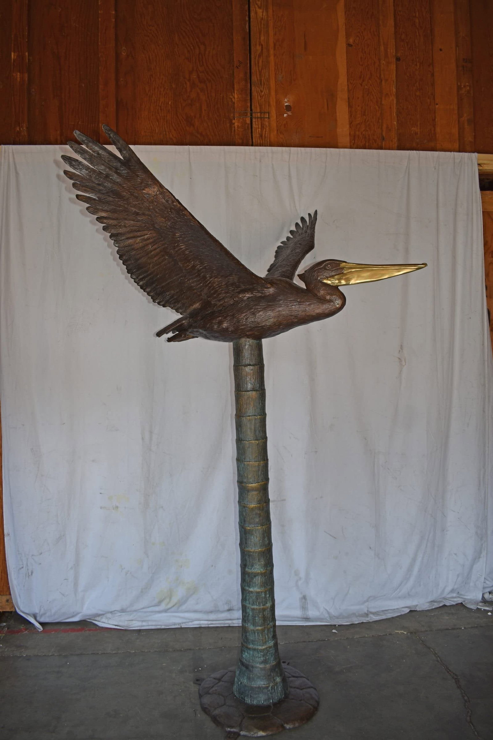 Life Size Pelican on a Three Bronze Statue - Size: 55"L x 46"W x 60"H. - 5