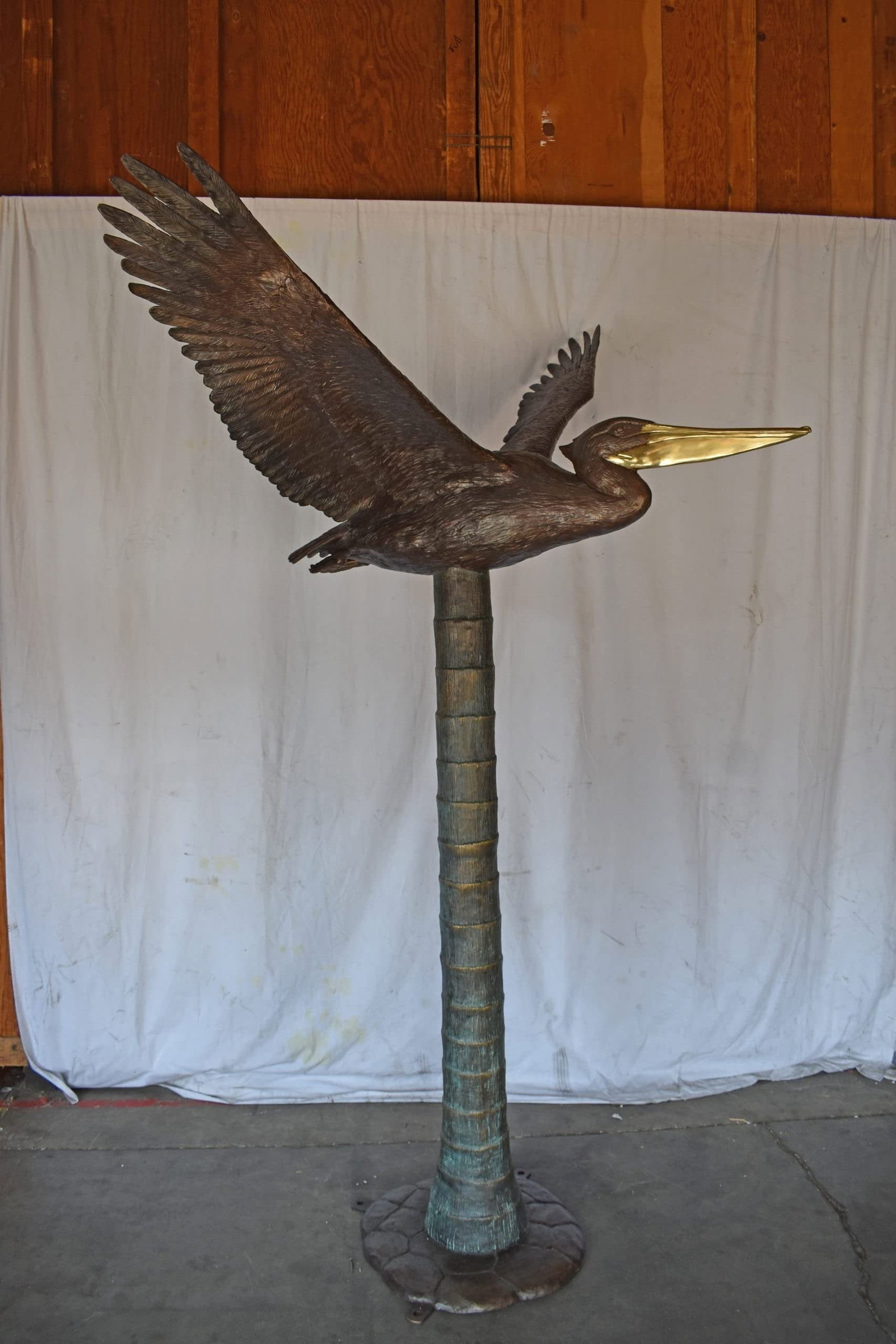 Life Size Pelican on a Three Bronze Statue - Size: 55"L x 46"W x 60"H. - 6