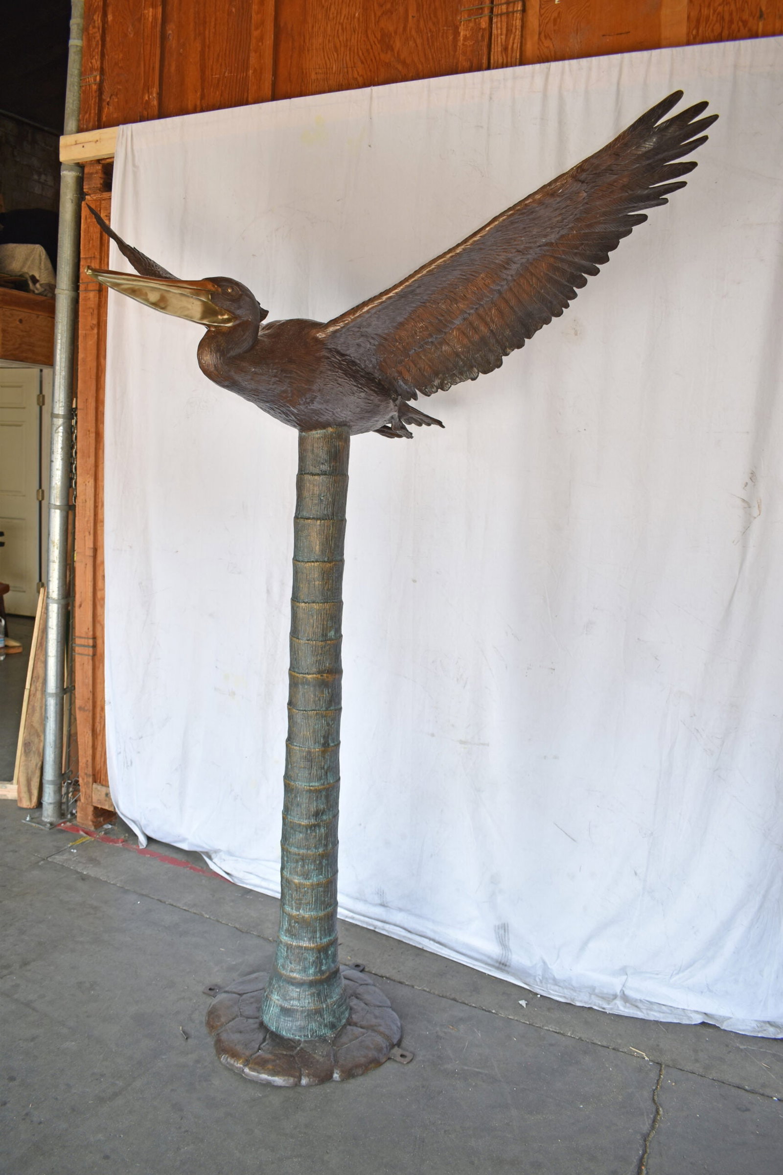 Life Size Pelican Flying Bronze Status - Size: 69"L x 45"W x 88"H. - 11