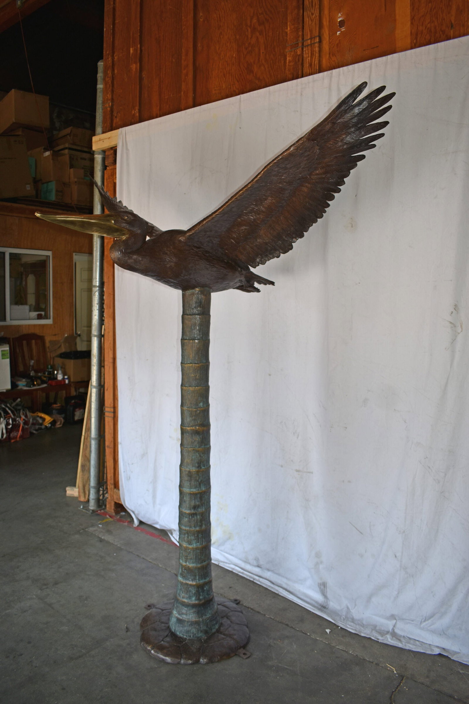 Life Size Pelican Flying Bronze Status - Size: 69"L x 45"W x 88"H. - 12