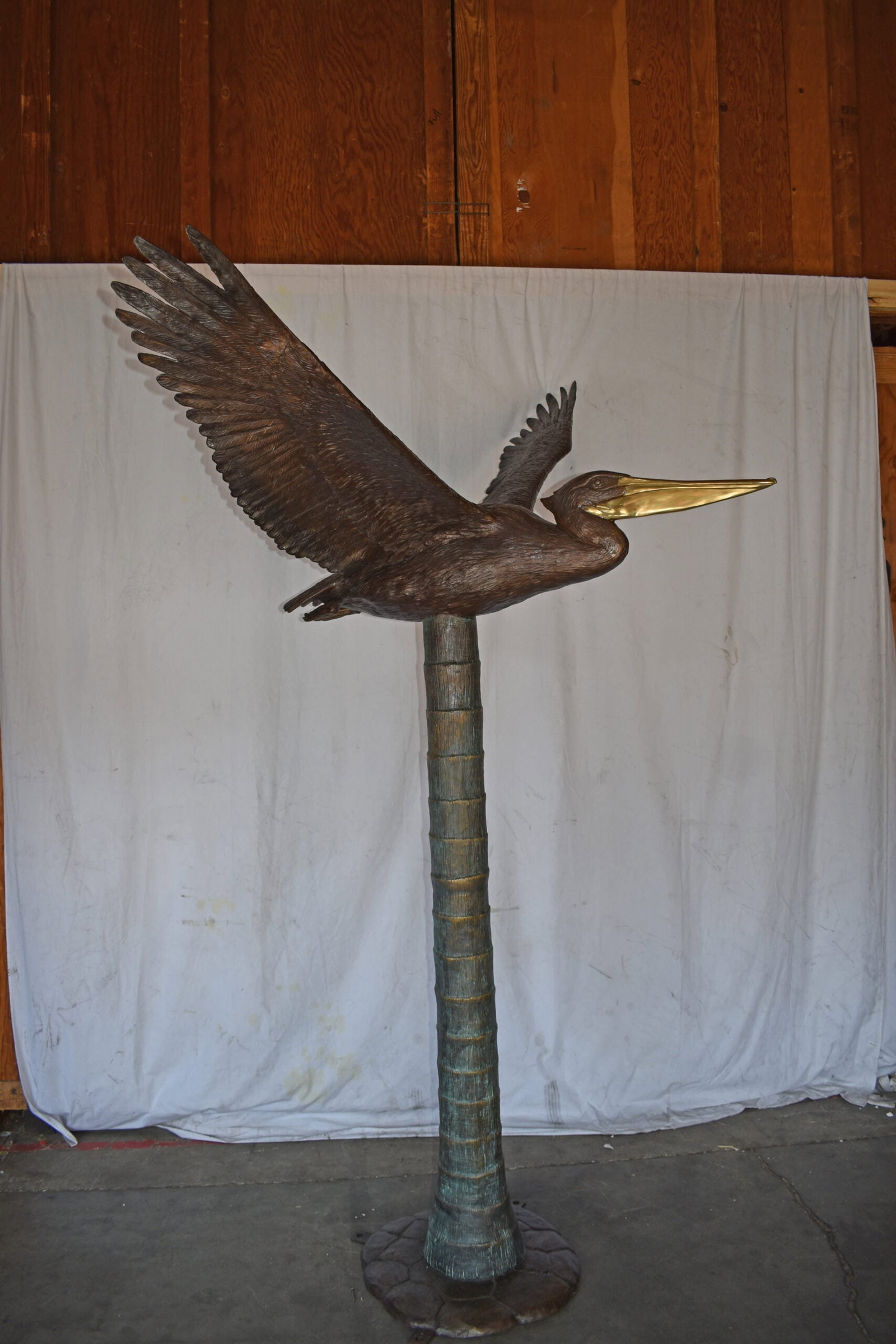 Life Size Pelican Flying Bronze Status - Size: 69"L x 45"W x 88"H. - 7