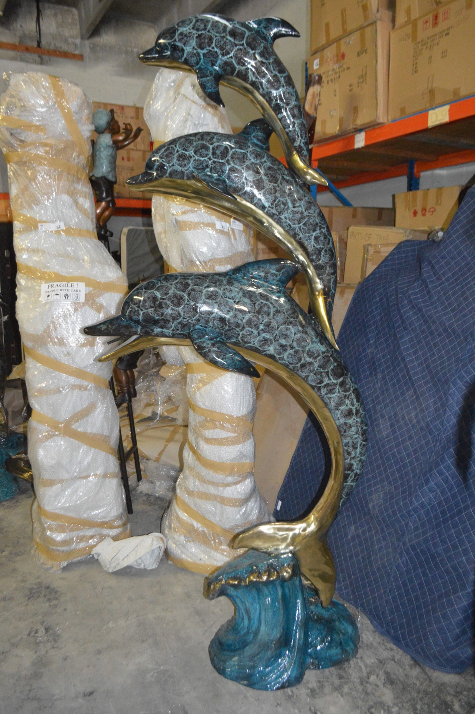 Three Dolphins Overreach Others Bronze Statue - Size: 28"L x 22"W x 89"H. - 9