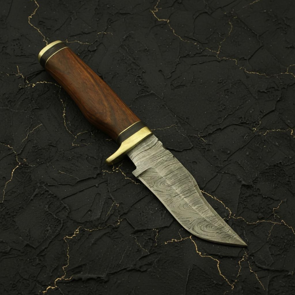 8" Hand Forged Damascus Hunting Knife with Custom Rosewood Handle & Leather Sheath: Title:8" Hand Forged Damascus Hunting Knife with Custom Rosewood Handle & Leather Sheath Description:This handcrafted hunting knife features a distinctive Damascus steel blade, known for its