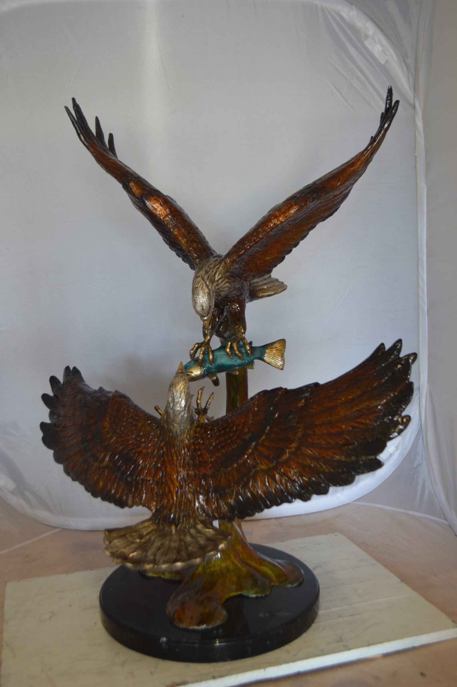 Two Eagles Fighting on Fish Bronze Statue - Size: 33"L x 28"W x 42"H. - 3