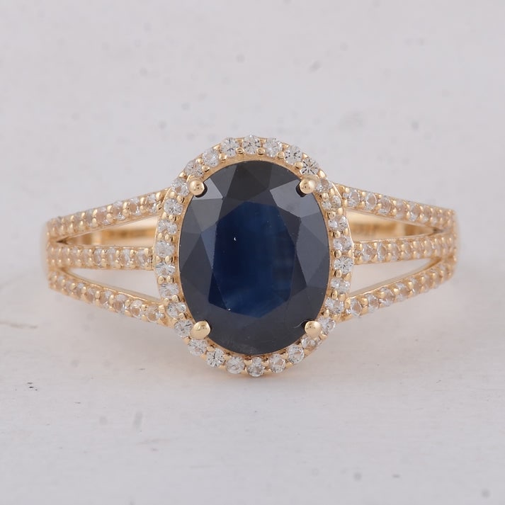2.68 Ct Oval Sapphire 9K Gold Ring: 2.68 Total Carat Sapphire 9K Gold Ring Specifications: Total Weight 2.54 g Center Gemstone Sapphire Gemstone Carat Weight 2.32 Carats Gemstone Measurements 9.10X7.10X3.70 mm Additional Gemstones White