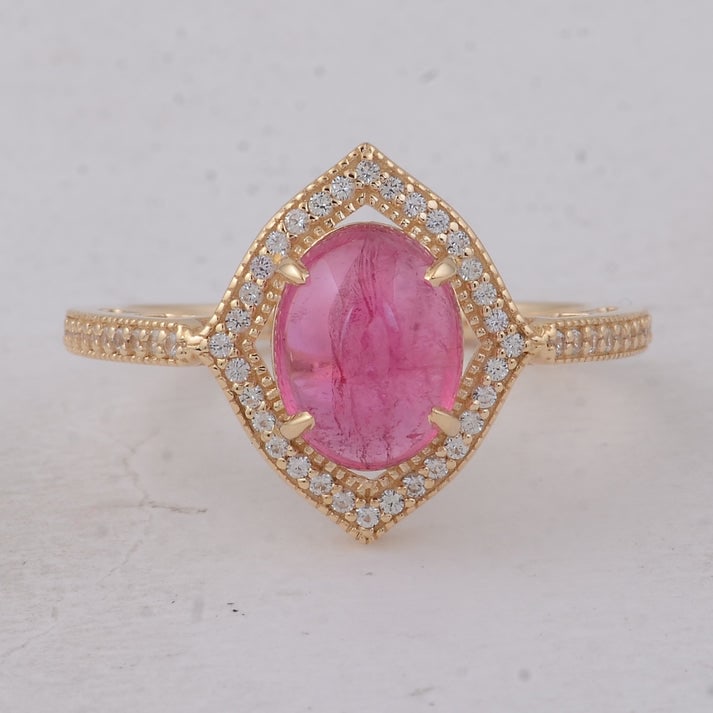 2.29 Ct Oval Tourmaline 9K Gold Ring: 2.29 Total Carat Tourmaline 9K Gold Ring Specifications: Total Weight 2.57 g Center Gemstone Tourmaline Gemstone Carat Weight 2.08 Carats Gemstone Measurements 9X7 mm Additional Gemstones White Sapphi