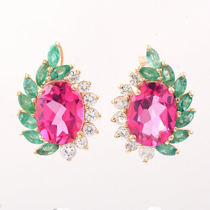 3.74 Ct Oval Pink Topaz 9K Gold Earrings: 3.74 Total Carat Pink Topaz 9K Gold Earrings Specifications: Total Weight 2.37 g Center Gemstone Pink Topaz Gemstone Carat Weight 3.02 Carats Gemstone Measurements 8.10X6.20X4 mm Additional Gemstones