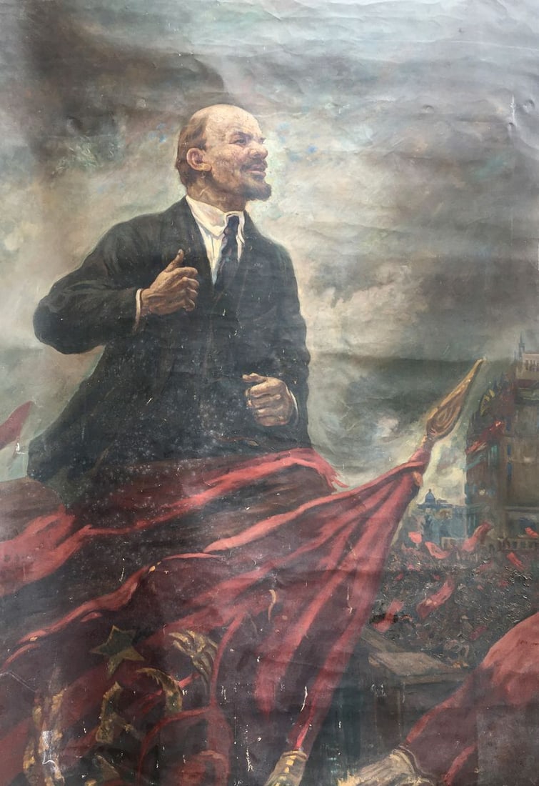 Oil painting Lenin on the podium: No.AAA2670 The oil painting depicts Lenin standing on a podium, his figure dominating the composition. He stands tall and imposing, with a stern expression on his face, as though he is delivering an i