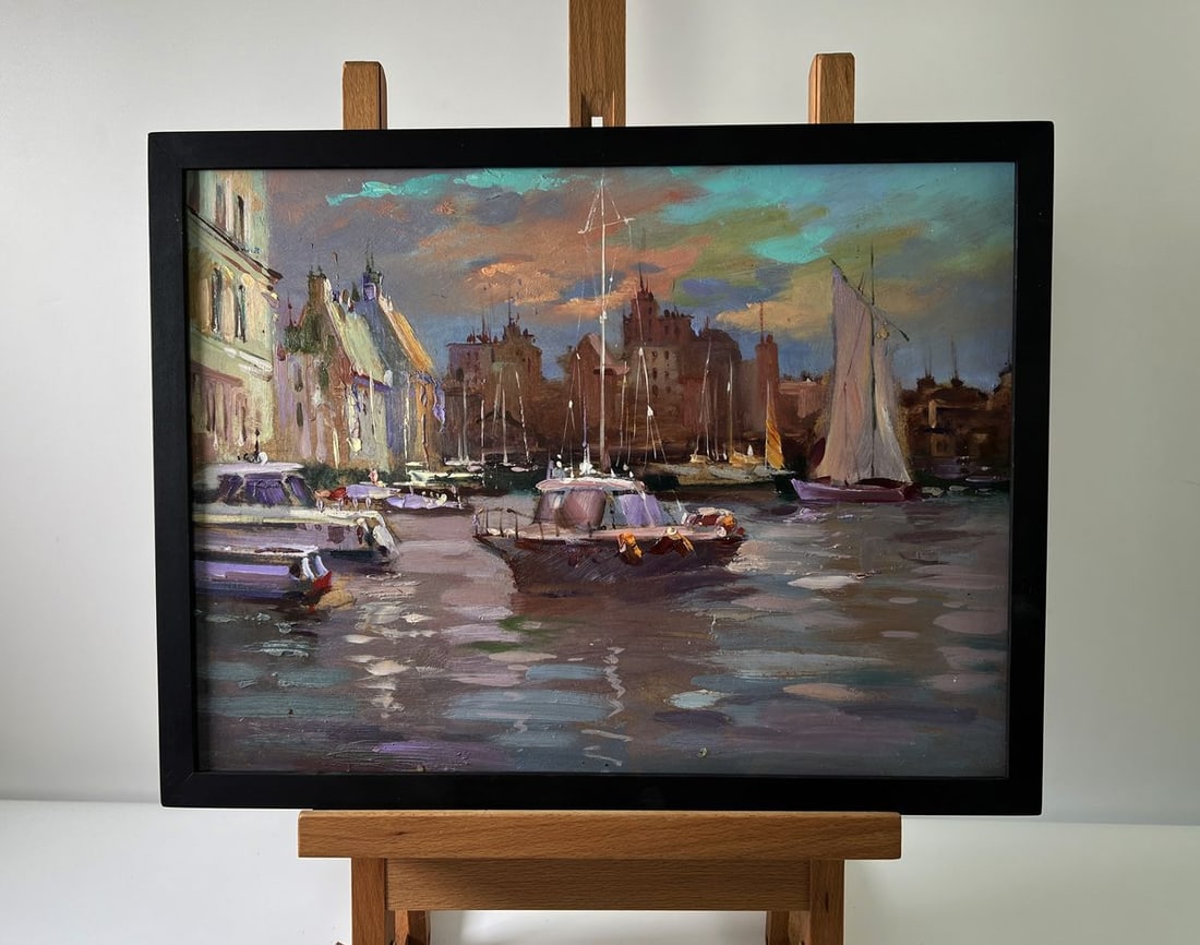 Oil painting City sailboats Yuriy Suprunchuk: No. AAA5672The Oil painting Cardboard titled “City sailboats” is a vibrant and atmospheric depiction of an urban harbor where architecture, water, and vessels harmonize in a dynamic yet serene