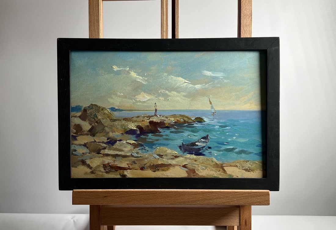 Oil painting Admire the sunset at sea Yuriy Suprunchuk: No. AAA4132The oil painting on cardboard, titled "Admire the Sunset at Sea", captures a serene coastal moment where the vastness of the ocean meets the warm glow of the setting sun. The artist employs