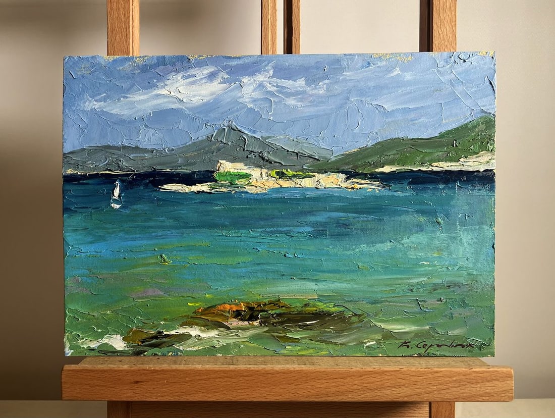 Oil painting Sea and mountains Boris Serdyuk: No. AAA3775This oil painting cardboard, titled "Sea and mountains", the composition is balanced and expansive, leading the viewer's eye across the calm, turquoise waters to the rocky shoreline and