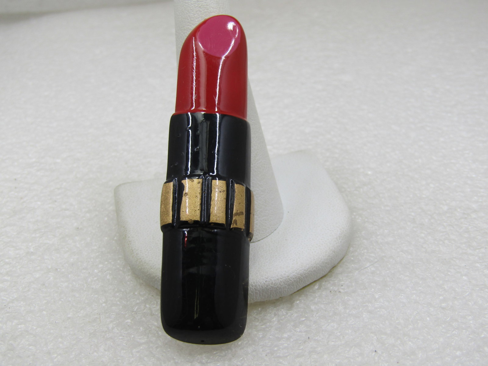 Vintage Lipstick Brooch, Red, Black, Gold, 2-7/8", Signed: Vintage Lipstick Brooch, Red, Black, Gold, 2-7/8", tall and 3/4" wide. Signed with a maker's mark that is unknown. Good to very good condition. Signed with a maker's mark that looks like an M or W in 