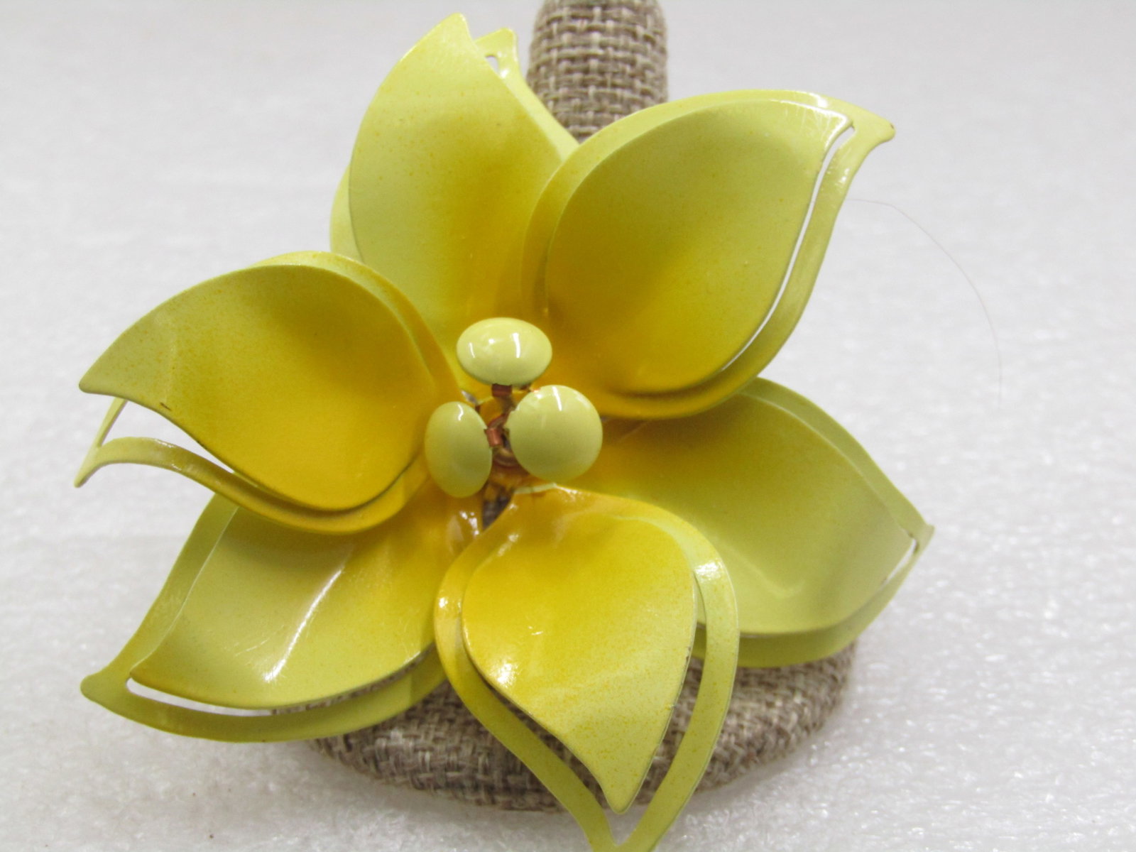 Vintage Yellow Enameled Flower Blossom Brooch, 1960's: Vintage Yellow Enameled Flower Blossom Brooch, 1960's. Nearly 3.5" across. It has pointed petals that are teared with a cut-out outline that sits lower than the more solid pointed petal with three