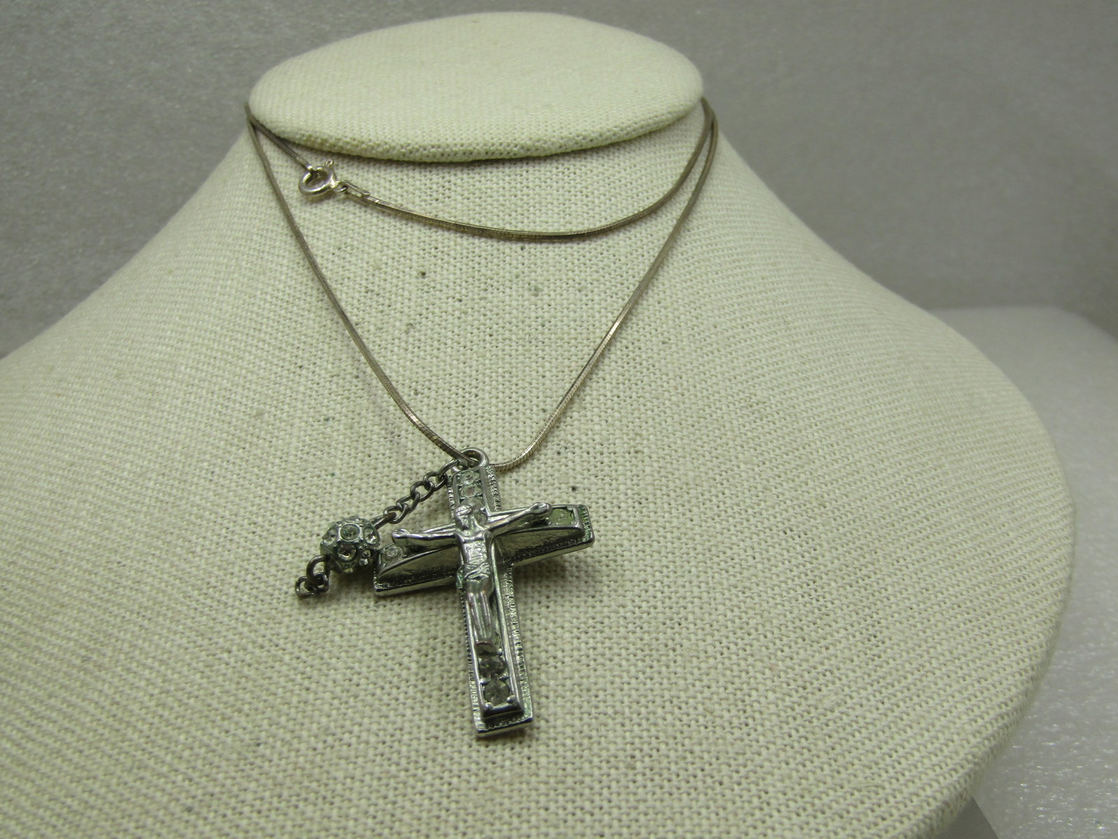 Vintage Rhinestone Crucifix Necklace, Sterling 24" Snake Chain: Vintage Rhinestone Crucifix Necklace, Sterling 24" Snake Chain. The chain is a 1mm round snake chain that is appx. 24" logn, spring clasp where it is marked .925 as well as signed oTc and Italy .925.