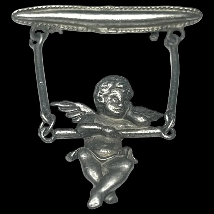 Vintage Articulated Swinging Cherub Brooch: Vintage Articulated Swinging Cherub BroochHallmarked: JJWeighs: 14 grams Measures: Approx 2.50 x 1.75 inches Vintage Hallmarked: JJ Sterling Weighs: 14 grams Measures: Approx 2.50 x 1.75 inches Reserv