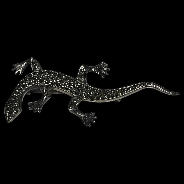 Vintage Sterling Silver Marcasite Lizard BroochSterling Silver, MarcasiteWeighs 9.9 gramsMeasures 3: Vintage Sterling Silver Marcasite Lizard BroochSterling Silver, MarcasiteWeighs 9.9 gramsMeasures 3 x 1 inches vintage Sterling Silver, Marcasite Weighs 9.9 gramsMeasures 3 x 1 inches Reserve: $30.00 