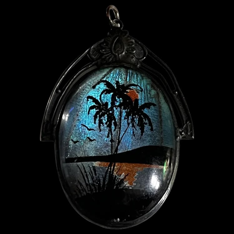Vintage Sterling Silver Butterfly Wing Palm Tree Paradise PendantWeight - 4.9 GramsMeasurements - 1: Vintage Sterling Silver Butterfly Wing Palm Tree Paradise PendantWeight - 4.9 GramsMeasurements - 1 x 1.5 InchesHallmarked - Sterling vintage Sterling Weight - 4.9 GramsMeasurements - 1 x 1.5 Inches