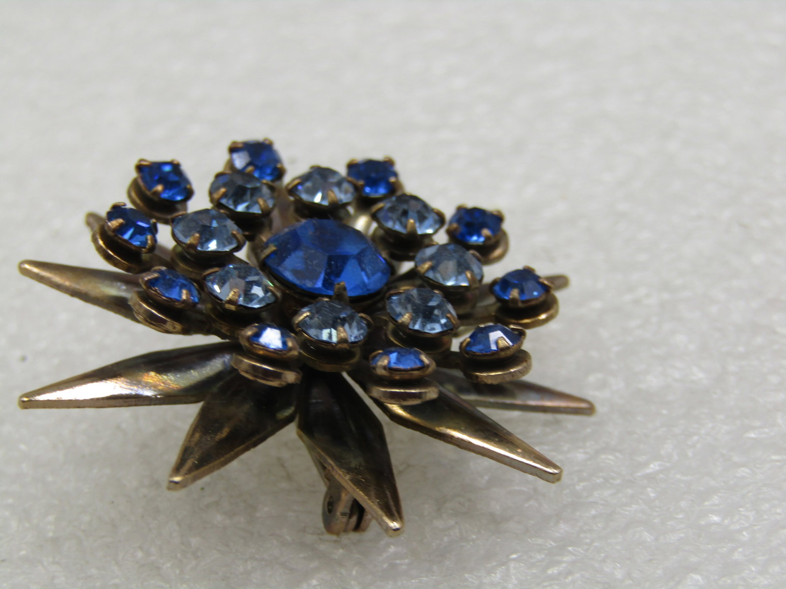 Vintage Shades of Blue Rhinestone Starburst Brooch, 1-5/8" - 2