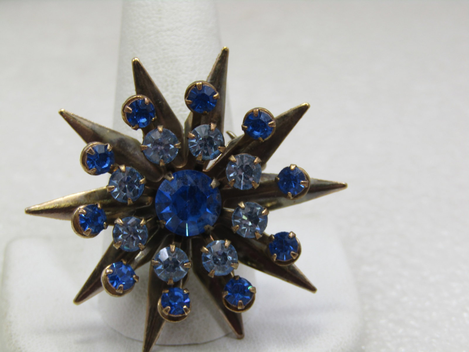 Vintage Shades of Blue Rhinestone Starburst Brooch, 1-5/8" - 5