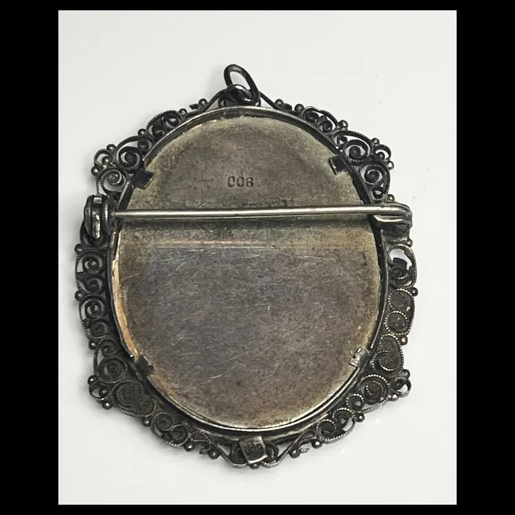 Vintage Filigree Silver 800 Framed Portrait BroochSilver 800Weighs 11.2 gramsMeasures 1.75 x 1.5 - 4